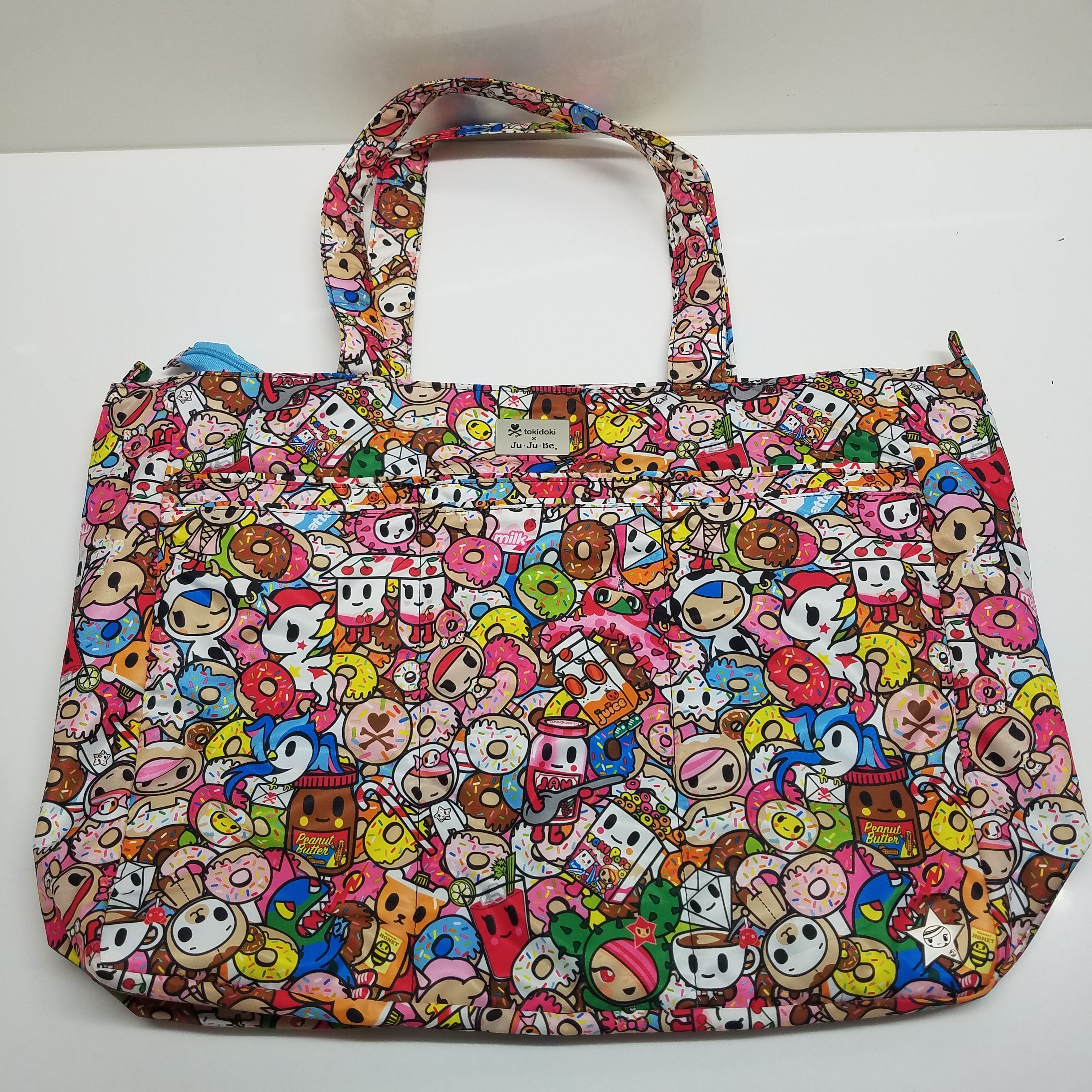 Buy the Tokidoki x Ju Ju Be Duffle Tote Bag Cartoon Print