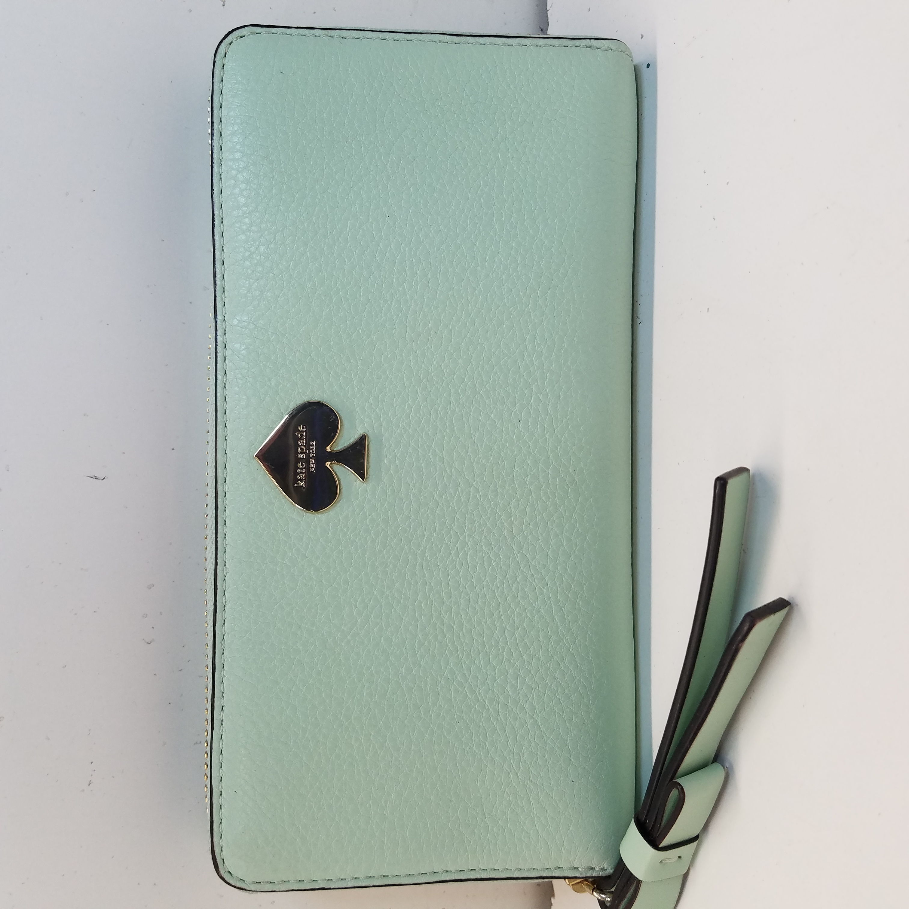 Buy the Kate Spade Mint Green Pebbled Clutch Zip Wallet | GoodwillFinds