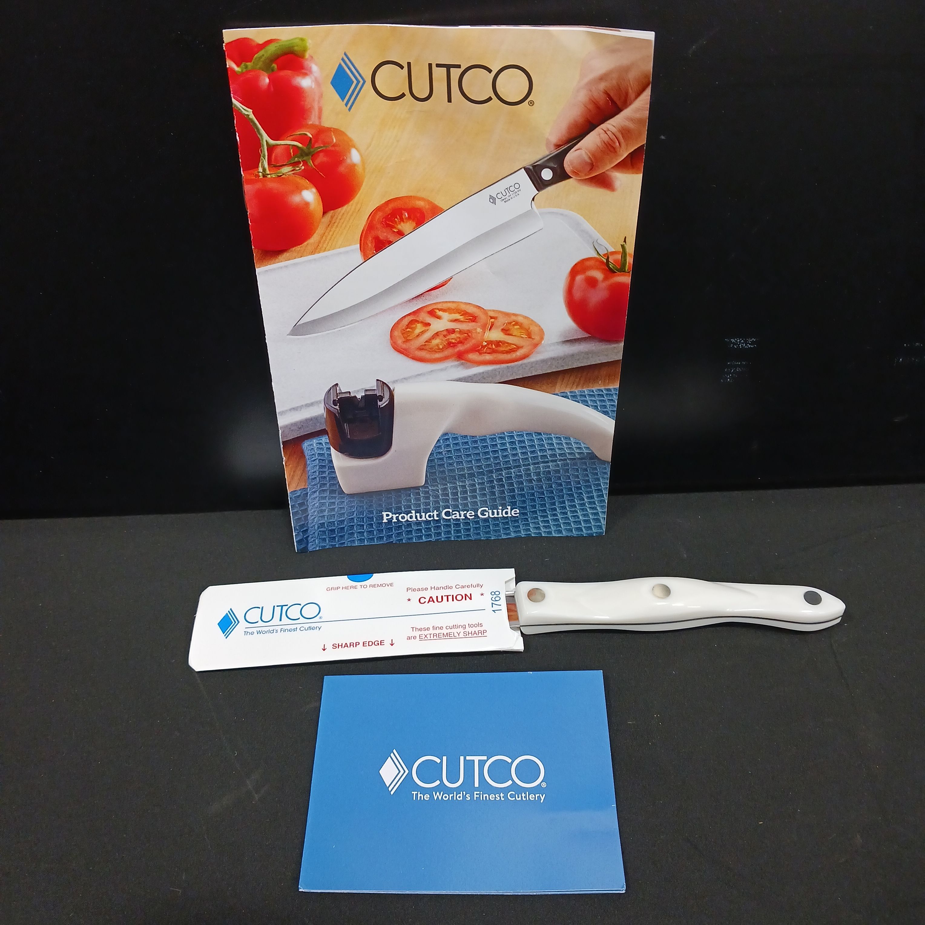 Model CUTCO 1768 Spatula Spreader with Pearl White handle. . . . . 4.9  High Carbon Stainless Double-D® serrated edge blade..5.1