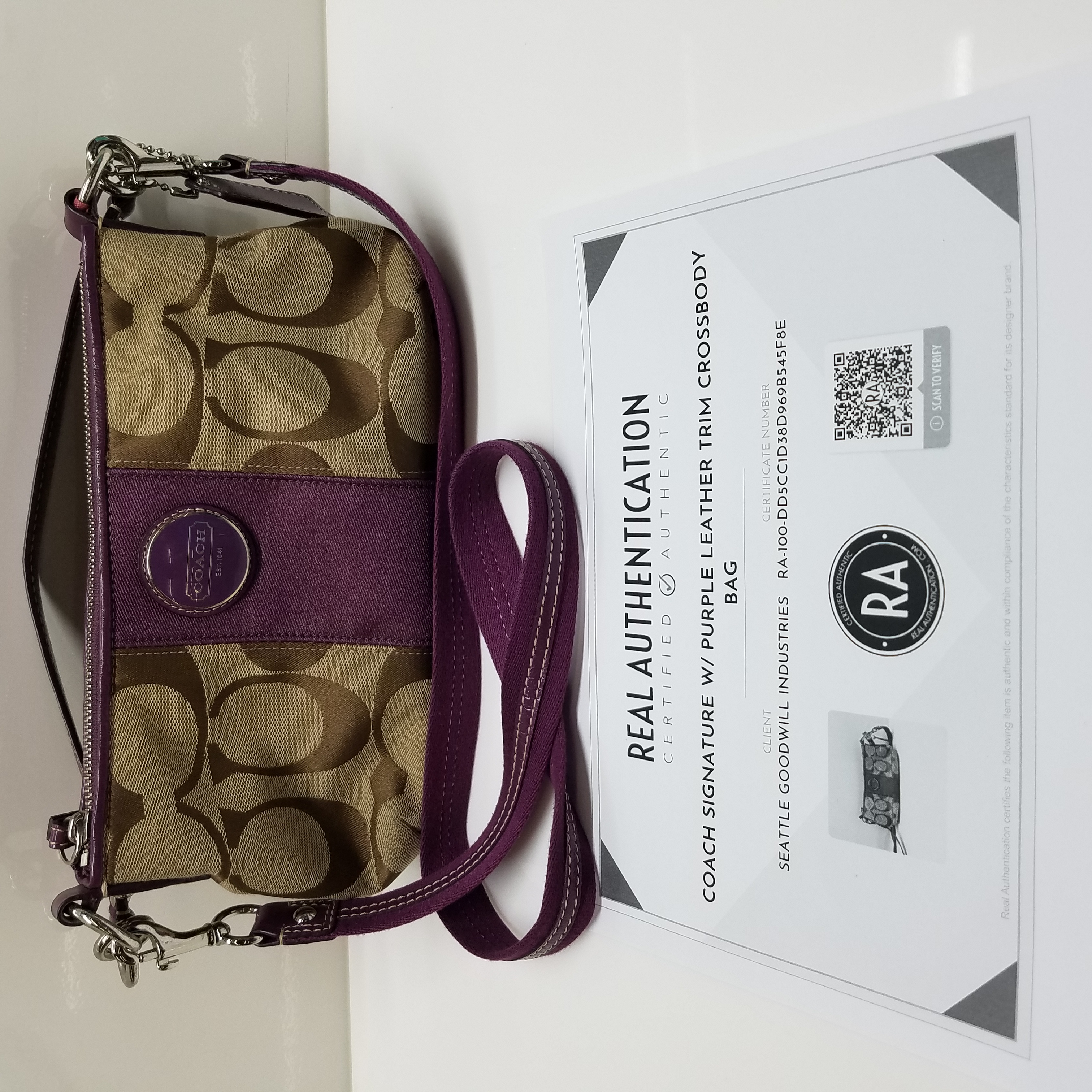 Buy the AUTHENTICATED Coach Signature w Purple Leather Trim