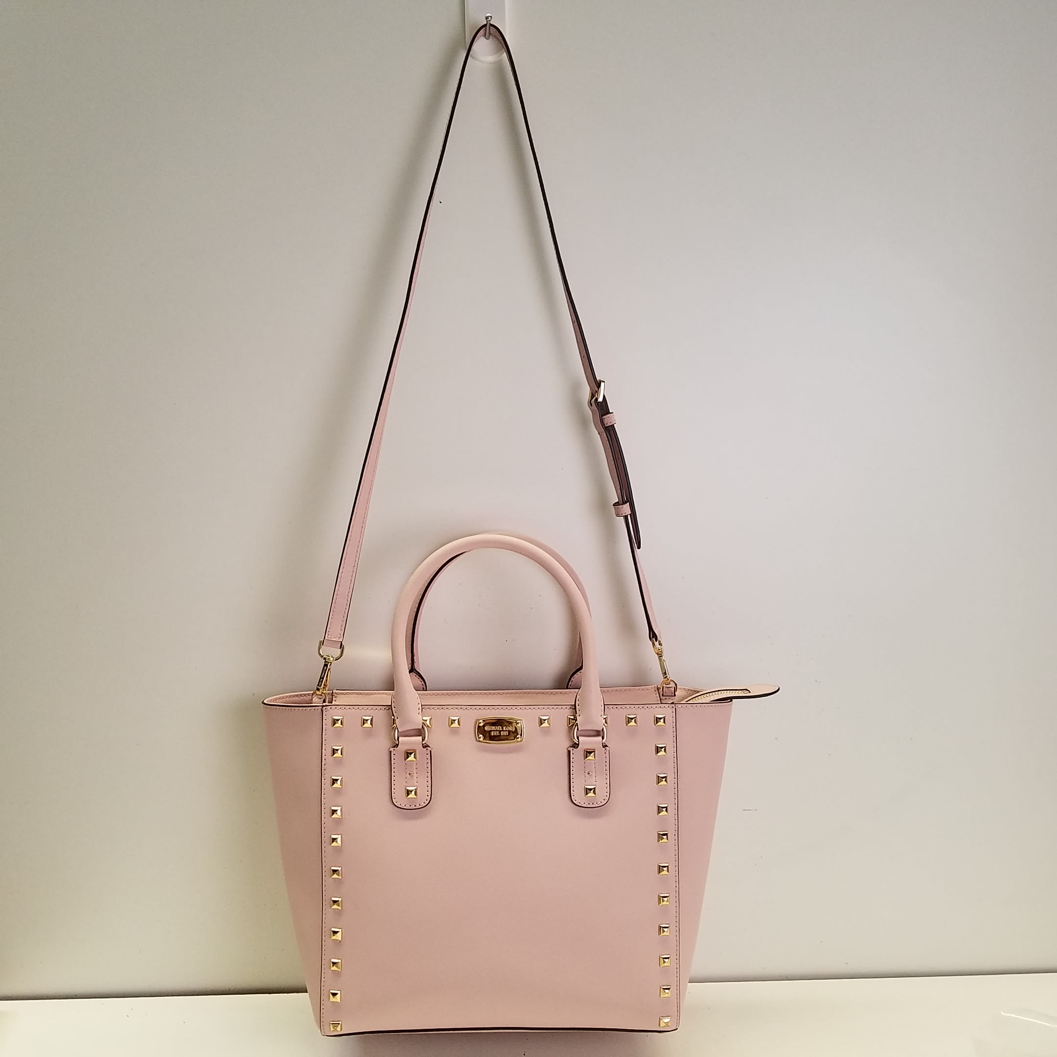 Michael Kors pink studded purse w/ pom - Bags and purses