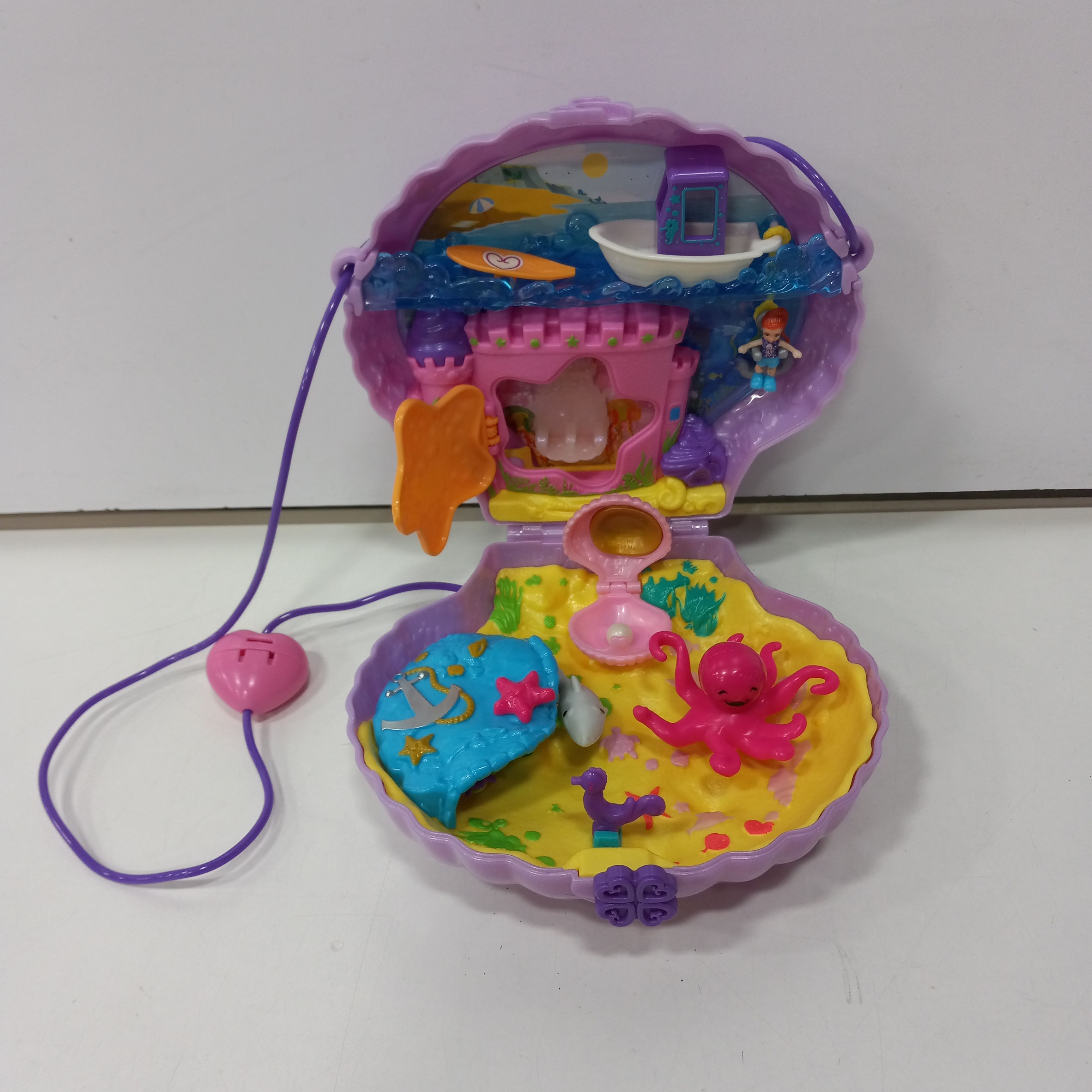 Buy the Polly Pocket Shell | GoodwillFinds