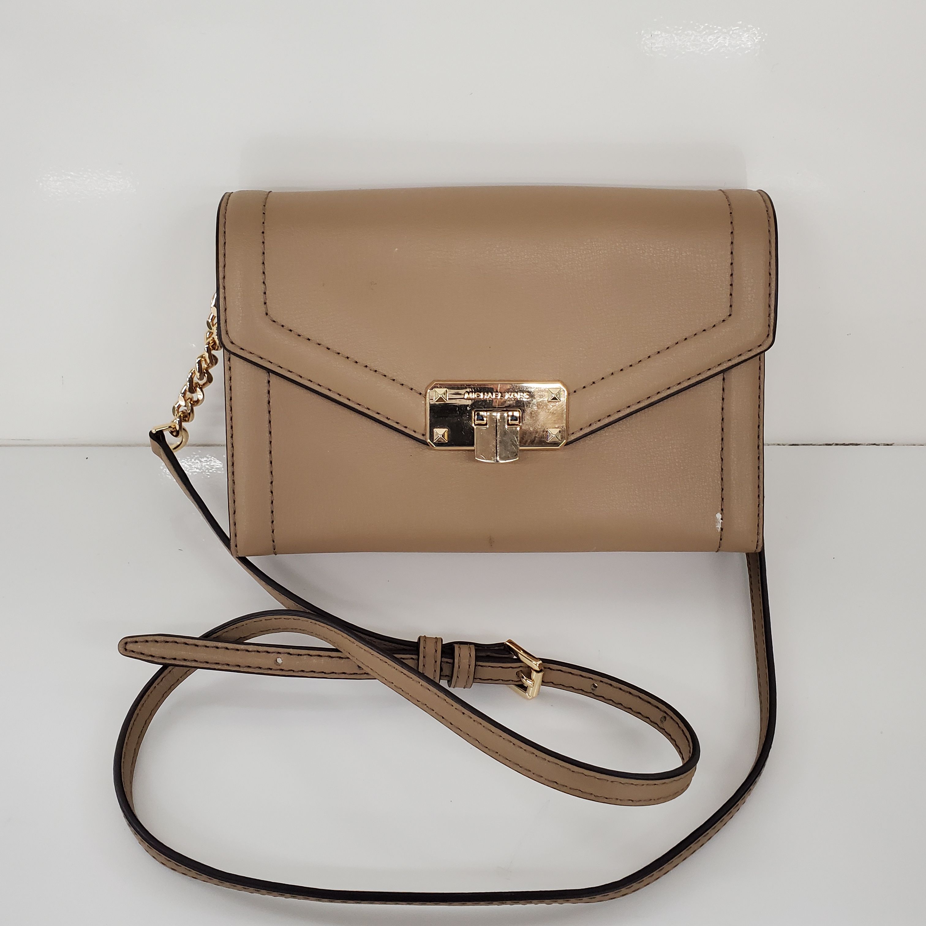 Buy the Michael Kors Crossbody Clutch Leather Bag | GoodwillFinds