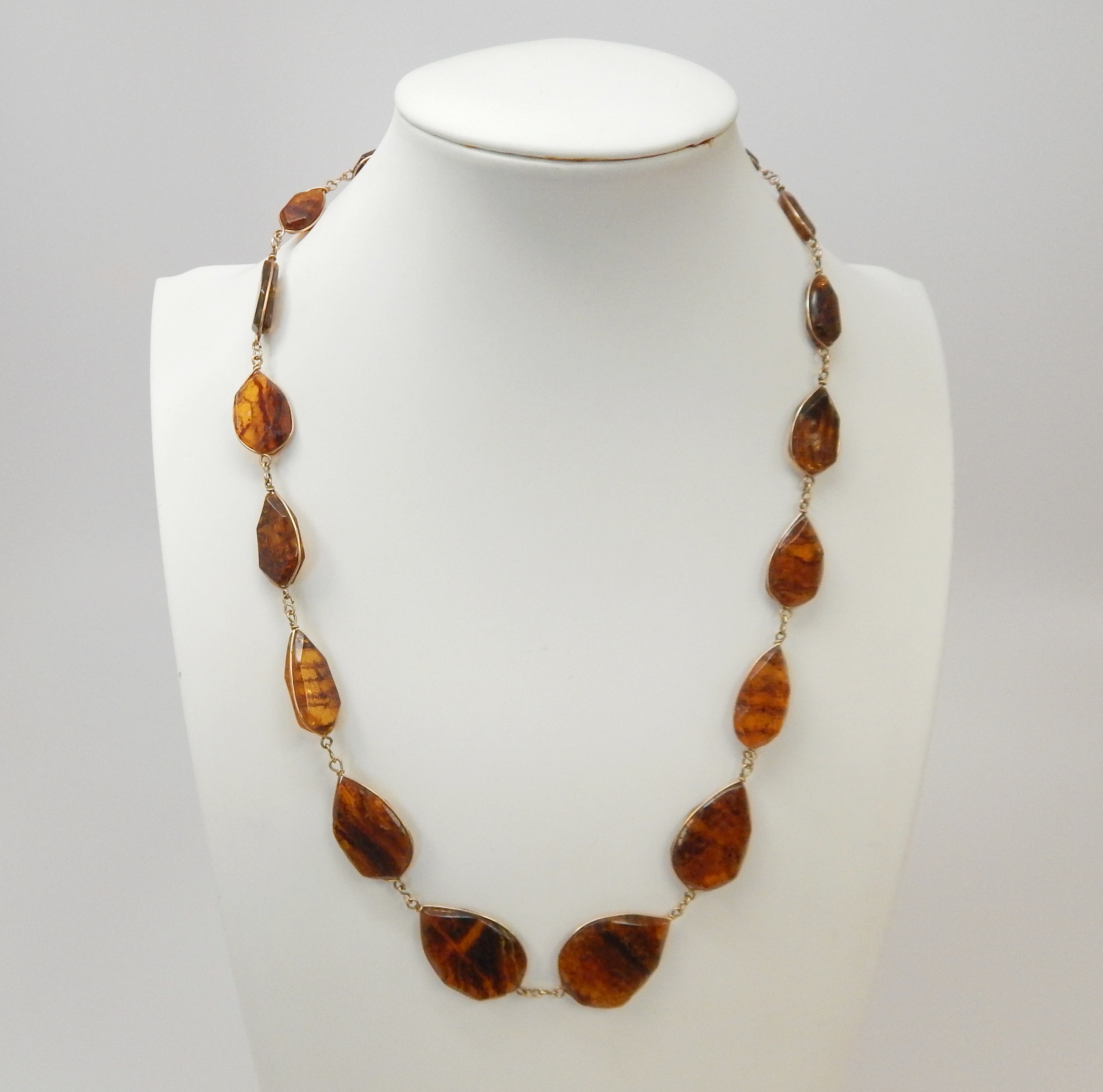 Buy the Artisan Gold Filled Wire Cognac Amber Graduated Flat Bead ...