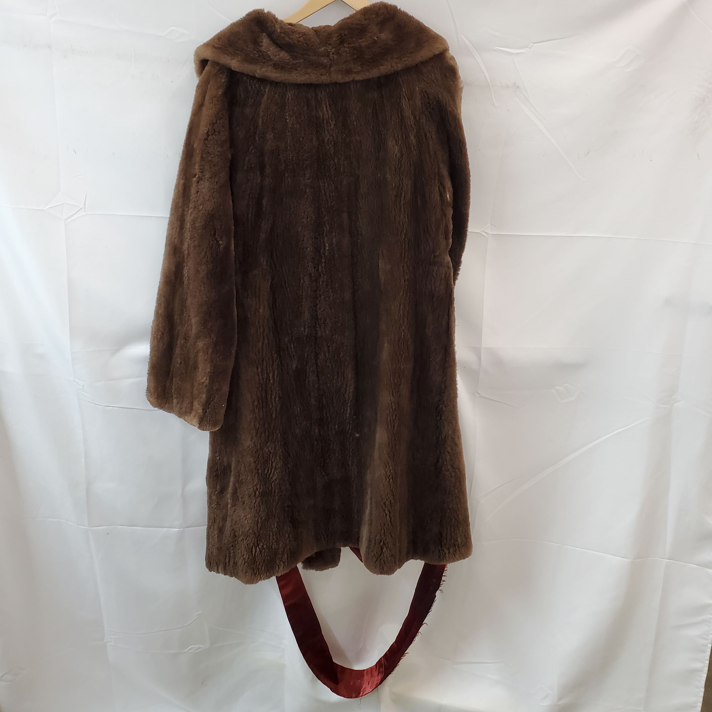 Buy the Brown Long Shaved Beaver Front Button Coat | GoodwillFinds