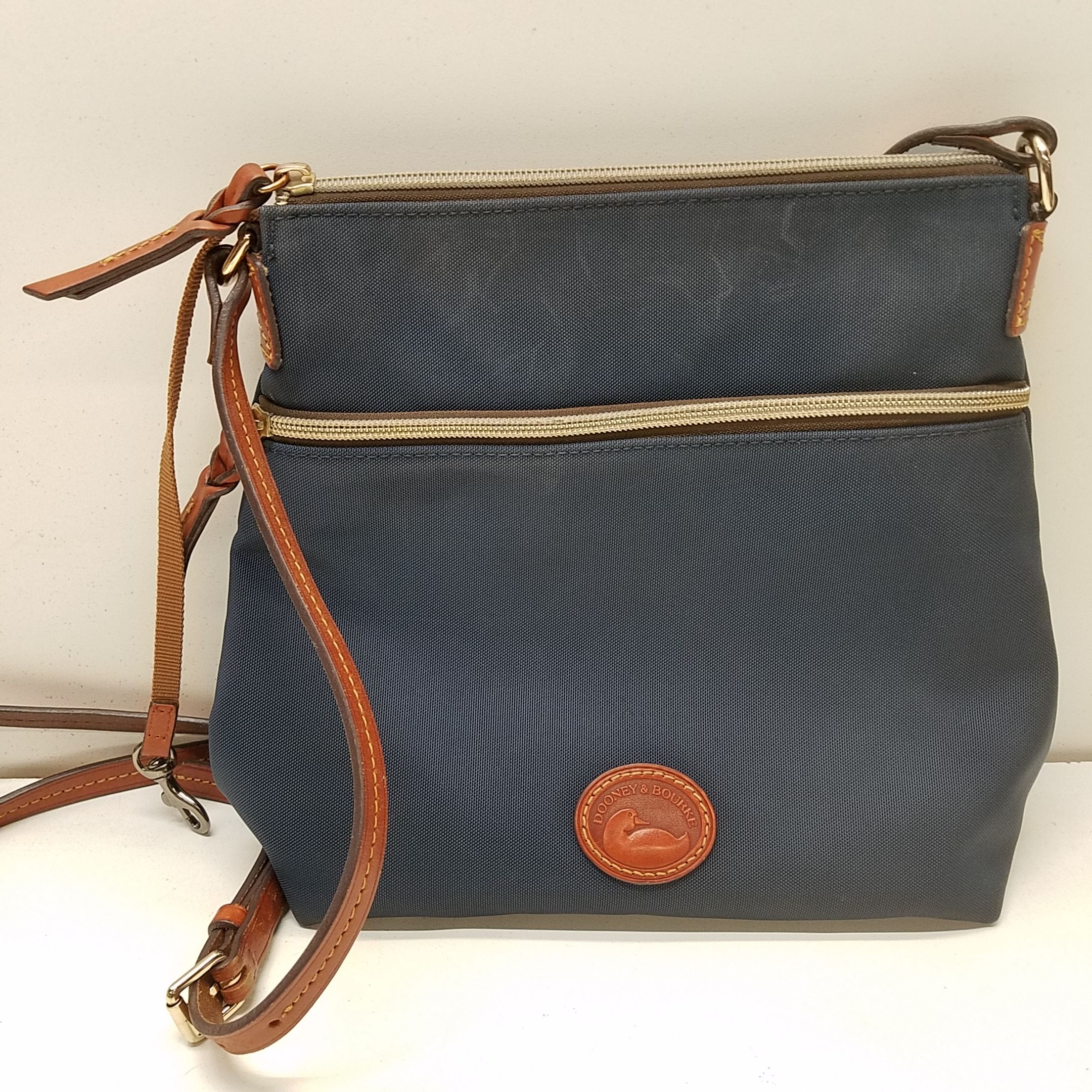 Buy the Dooney & Bourke Nylon Crossbody Bag Blue | GoodwillFinds