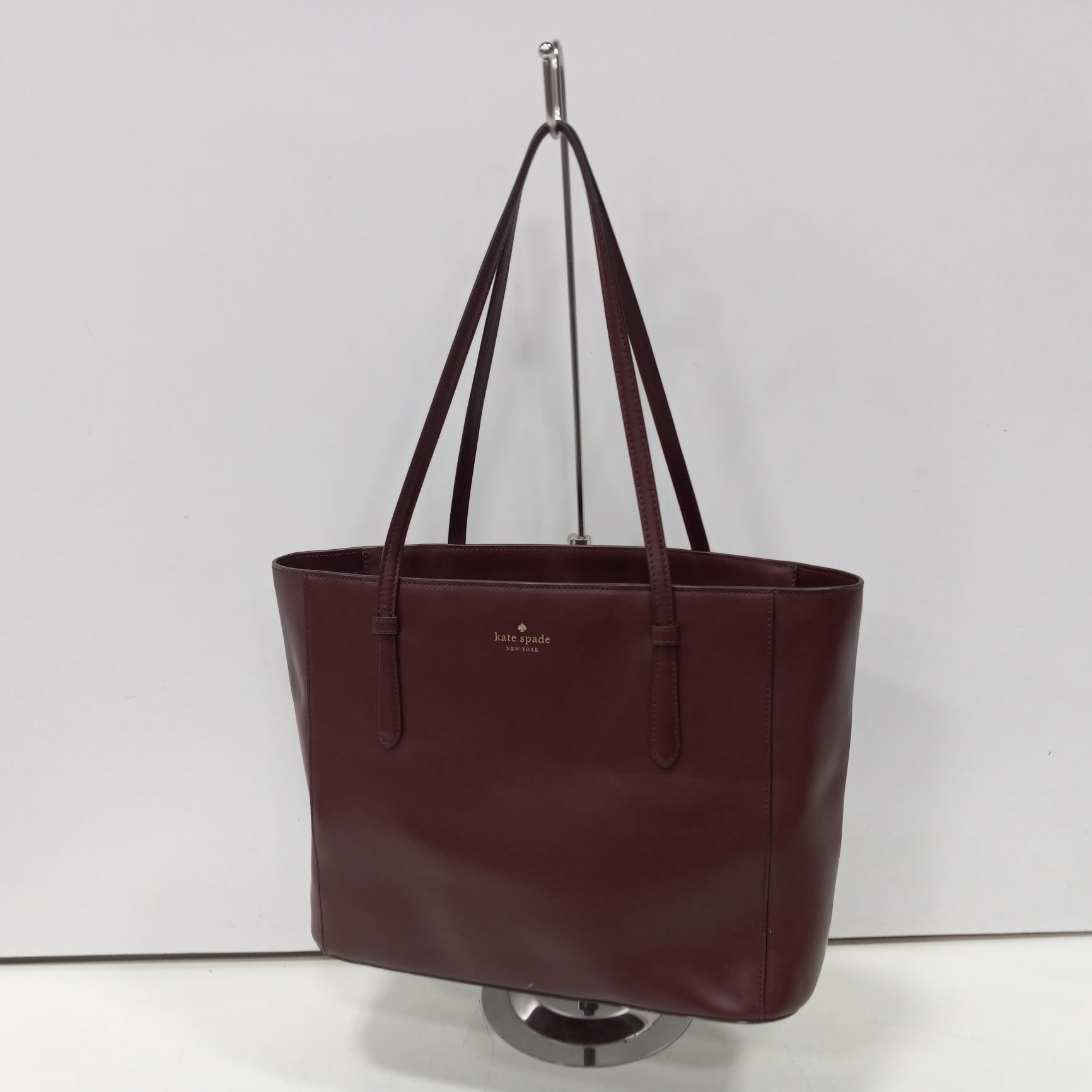 Buy the Kate Spade New York Maroon Schuyler Medium Tote Bag | GoodwillFinds
