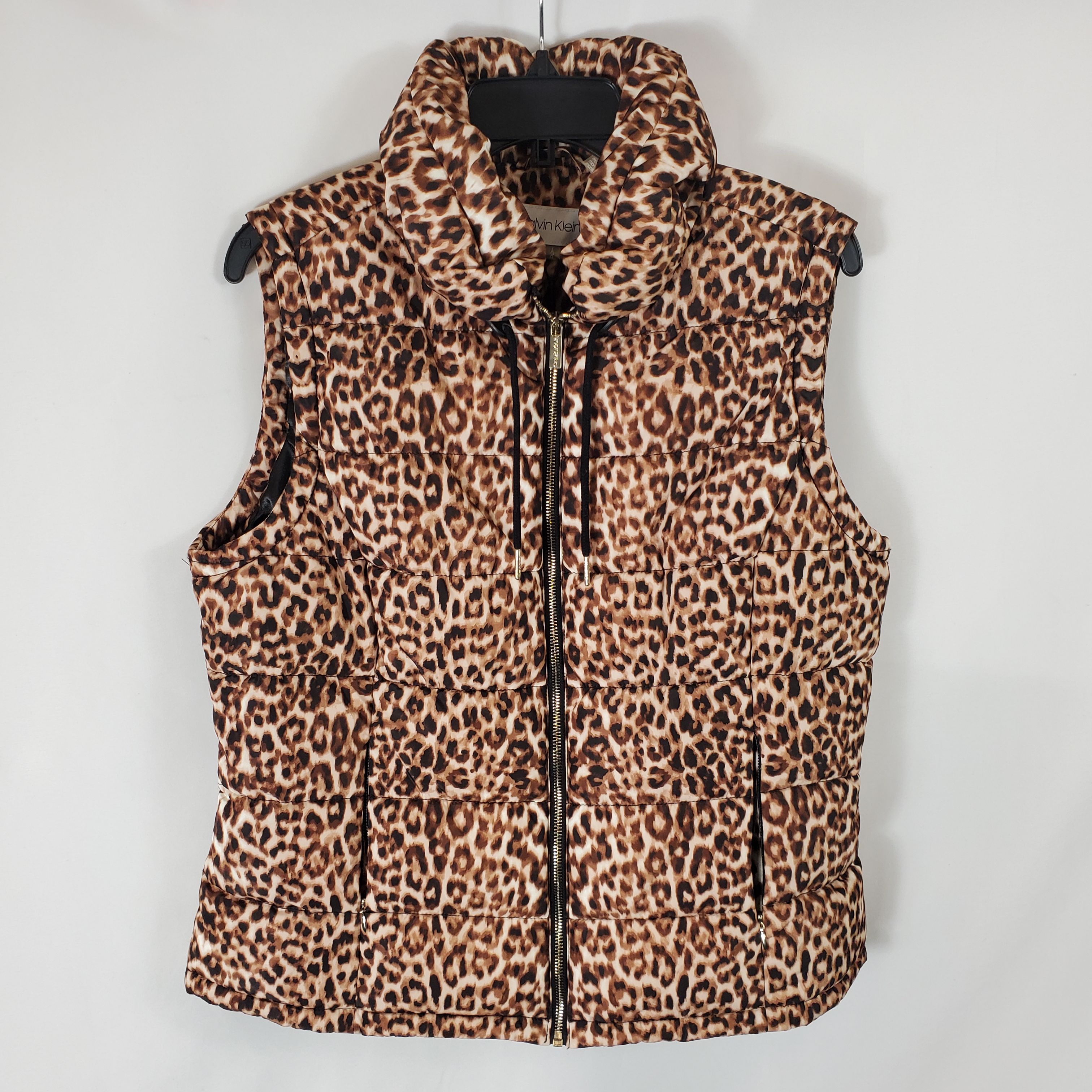 Buy the Calvin Klein Women Cheetah Puffer Vest L NWT | GoodwillFinds