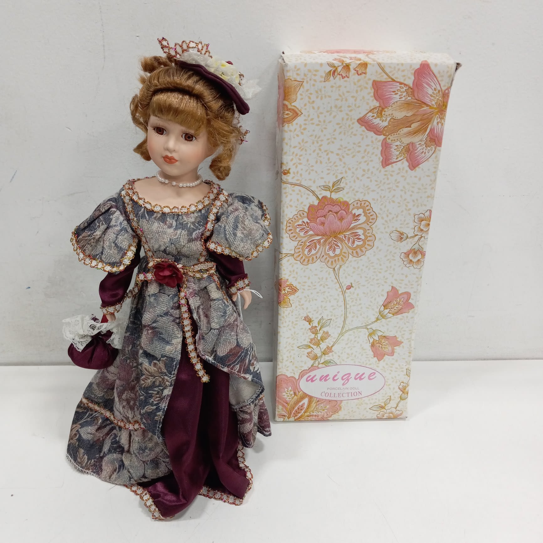 Buy the Unique Brand 1-5000 Porcelain Doll IOB | GoodwillFinds