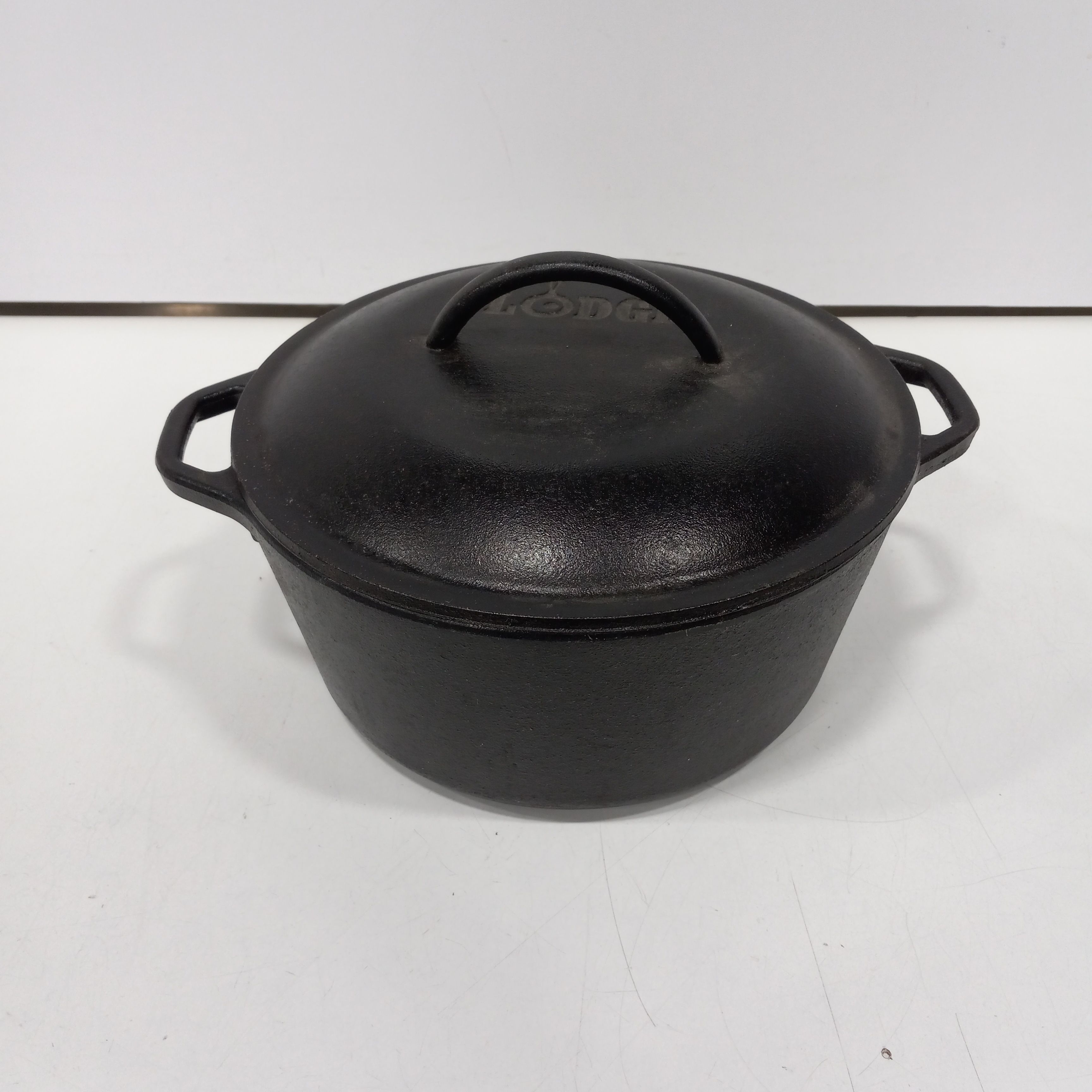 Buy The Lodge 8DOL Cast Iron Dutch Oven With Lid | GoodwillFinds