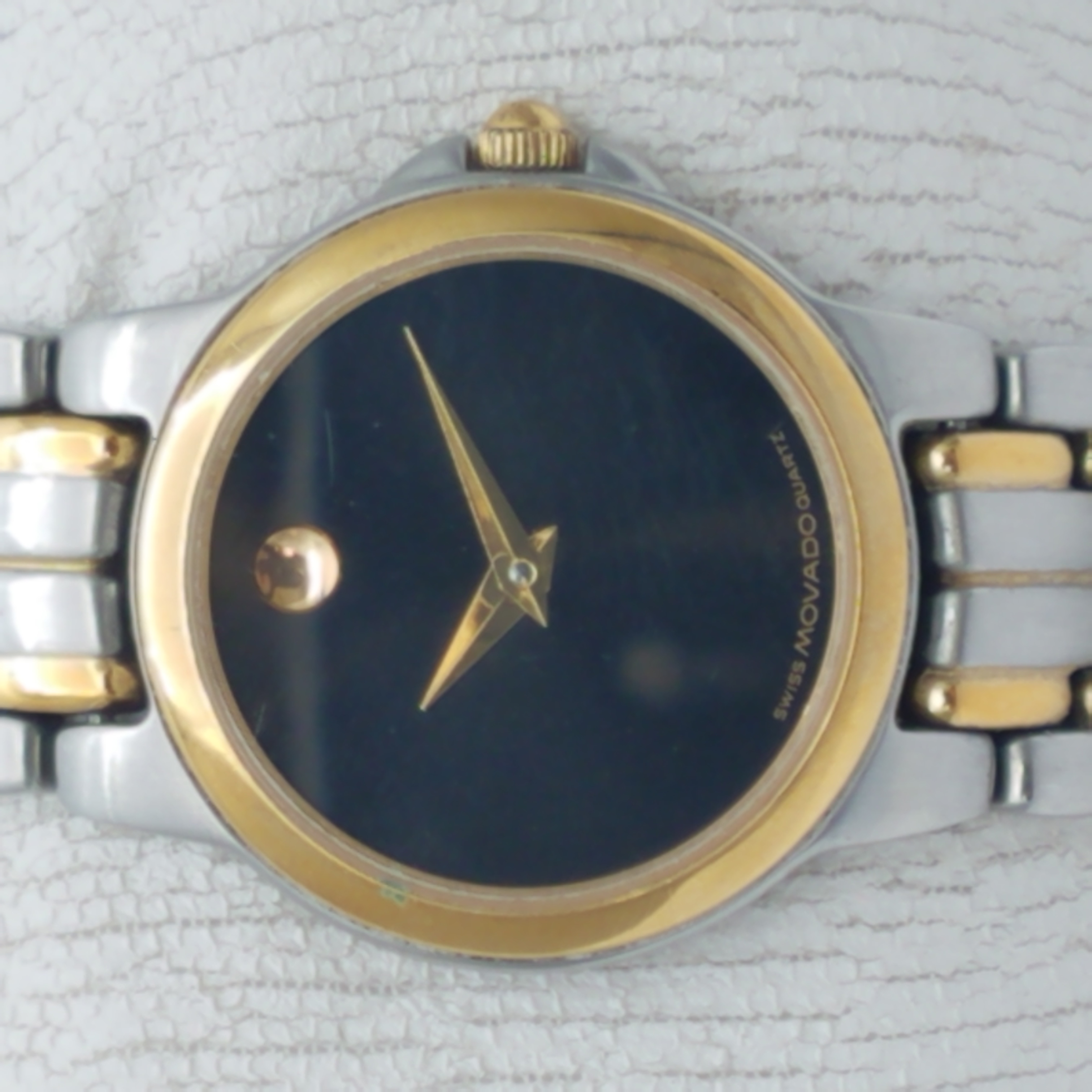 Swiss movado hot sale quartz gold