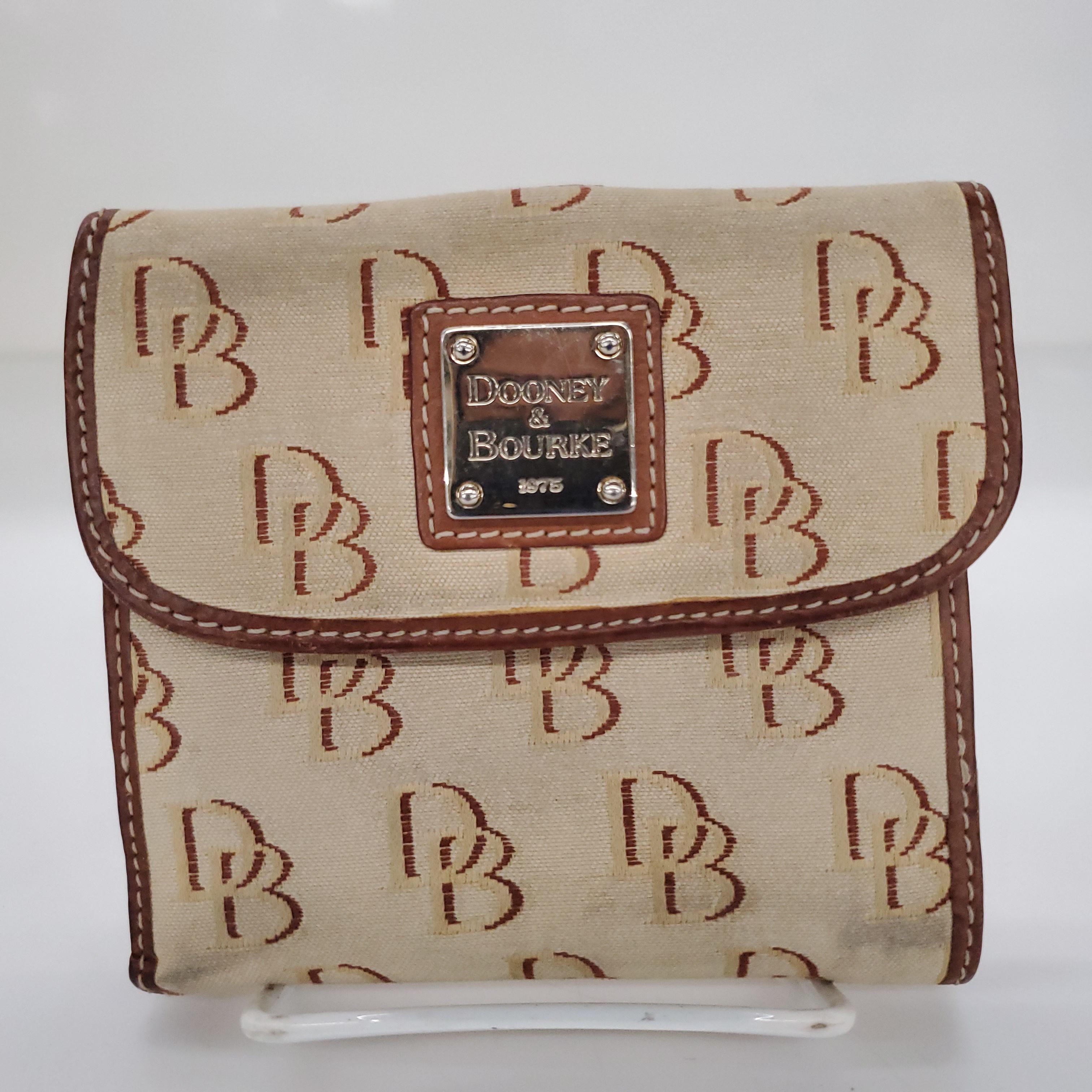 Buy the Dooney & Bourke Logo Small Flap Credit Card Wallet