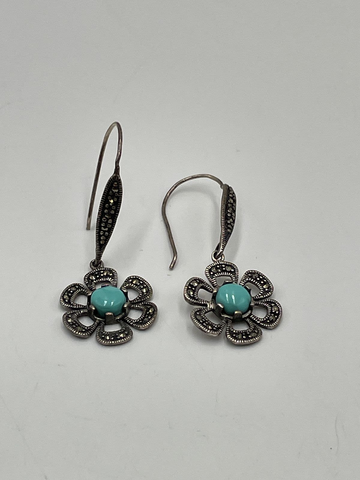 Buy the 925 Sterling Silver Womens Blue Stone Flower Shape Dangle