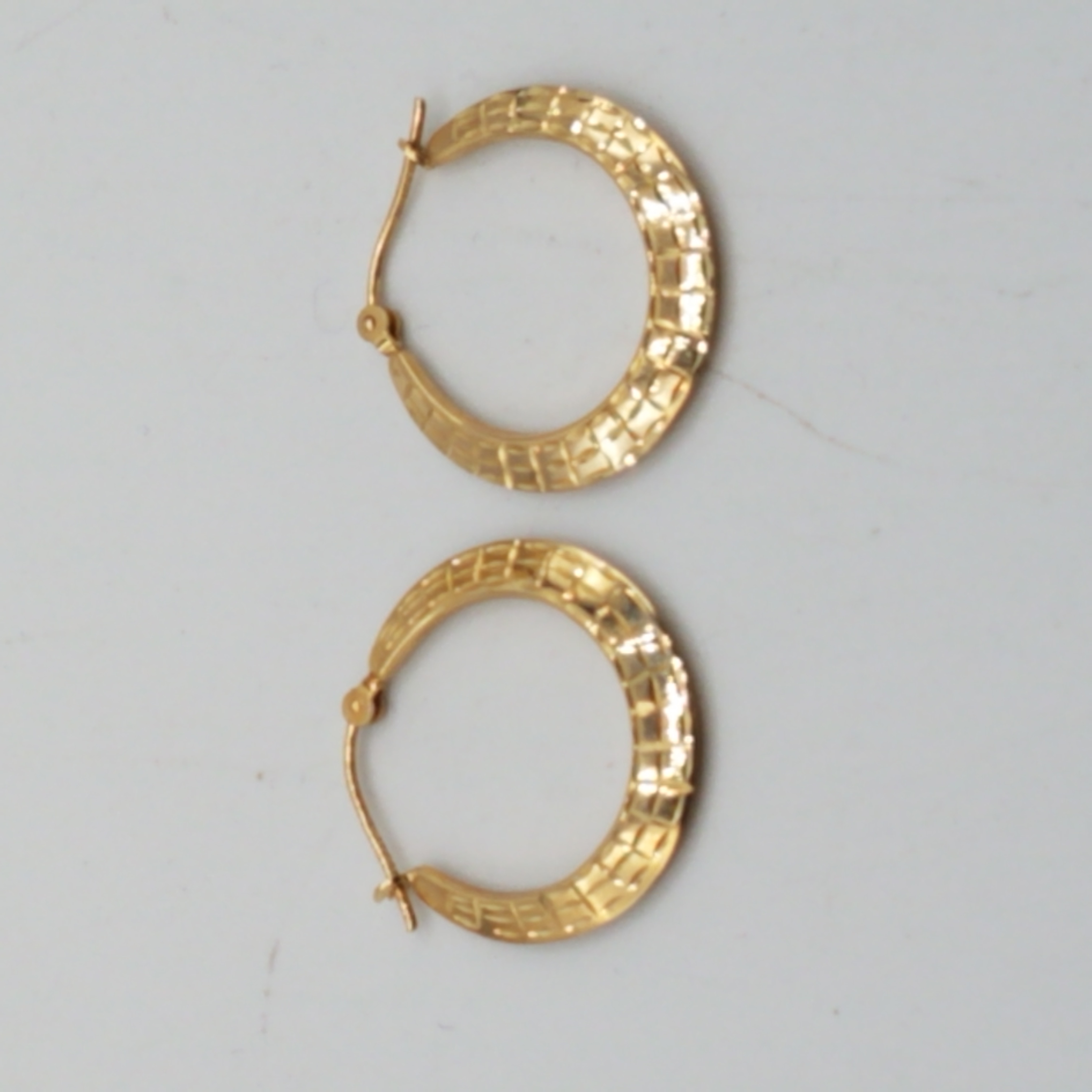 Buy the 10K Gold Etched Hoop Earrings | GoodwillFinds