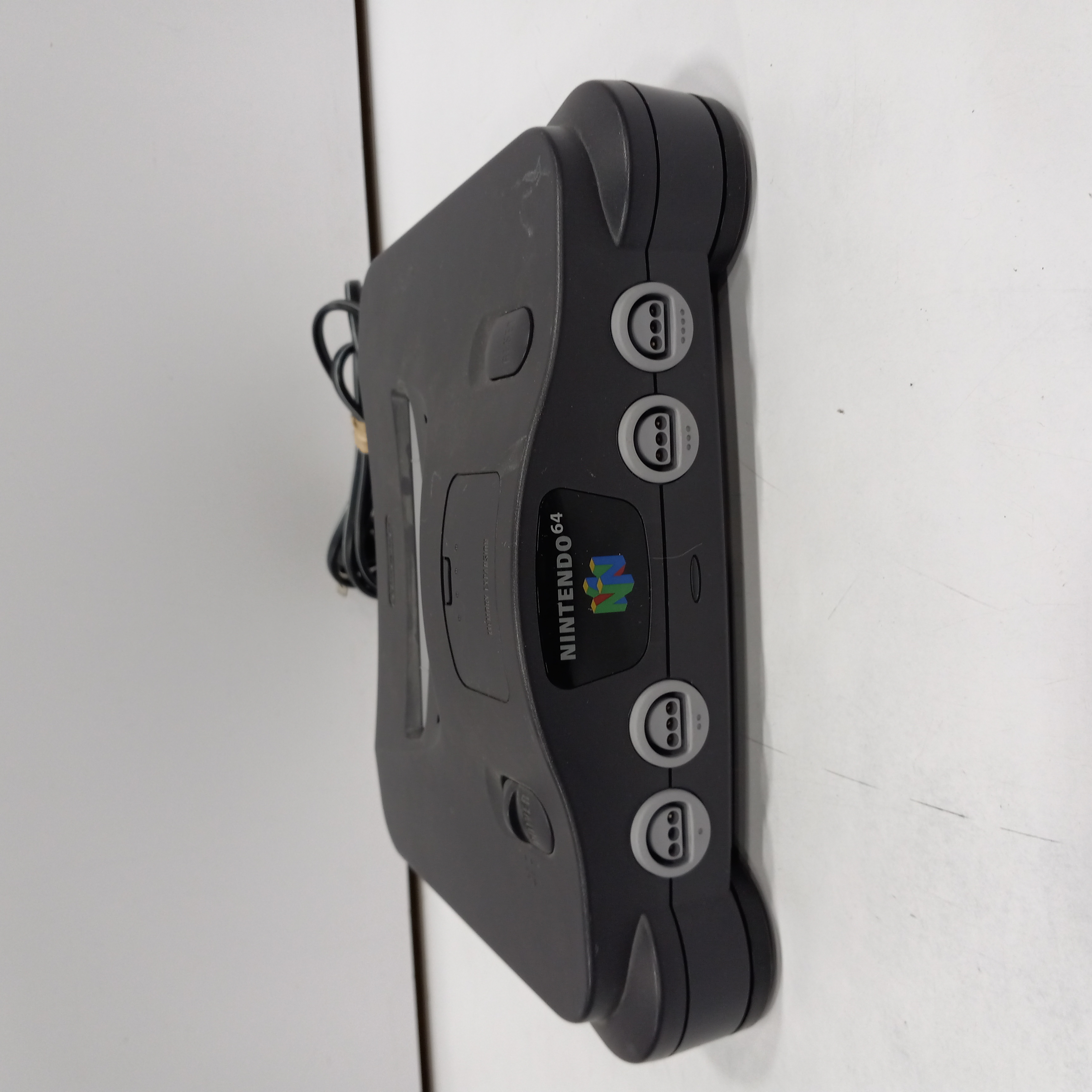 Buy the NINTENDO 64 CORDS CONTROLLERS AND 7 GAMES | GoodwillFinds