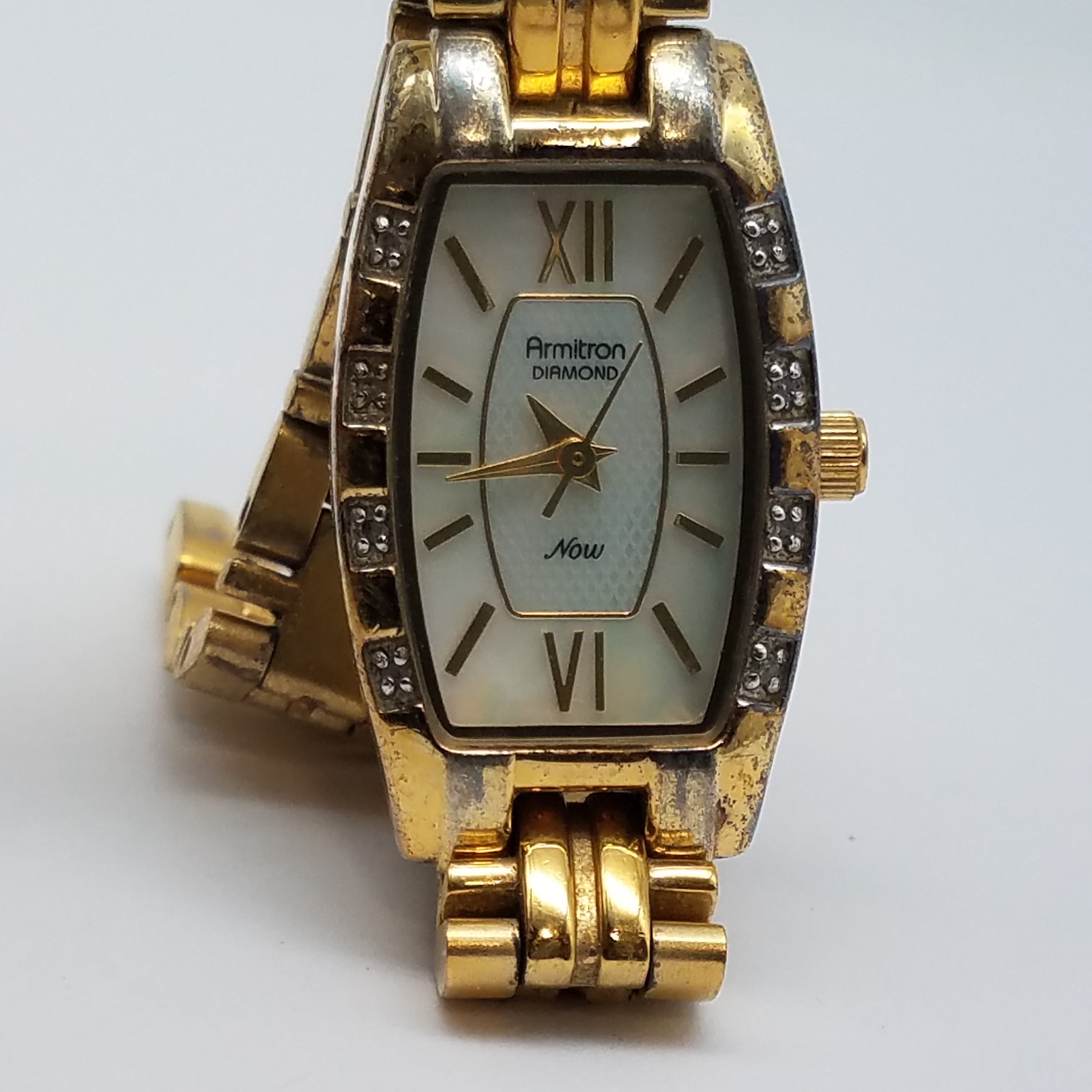 Armitron gold watch sale