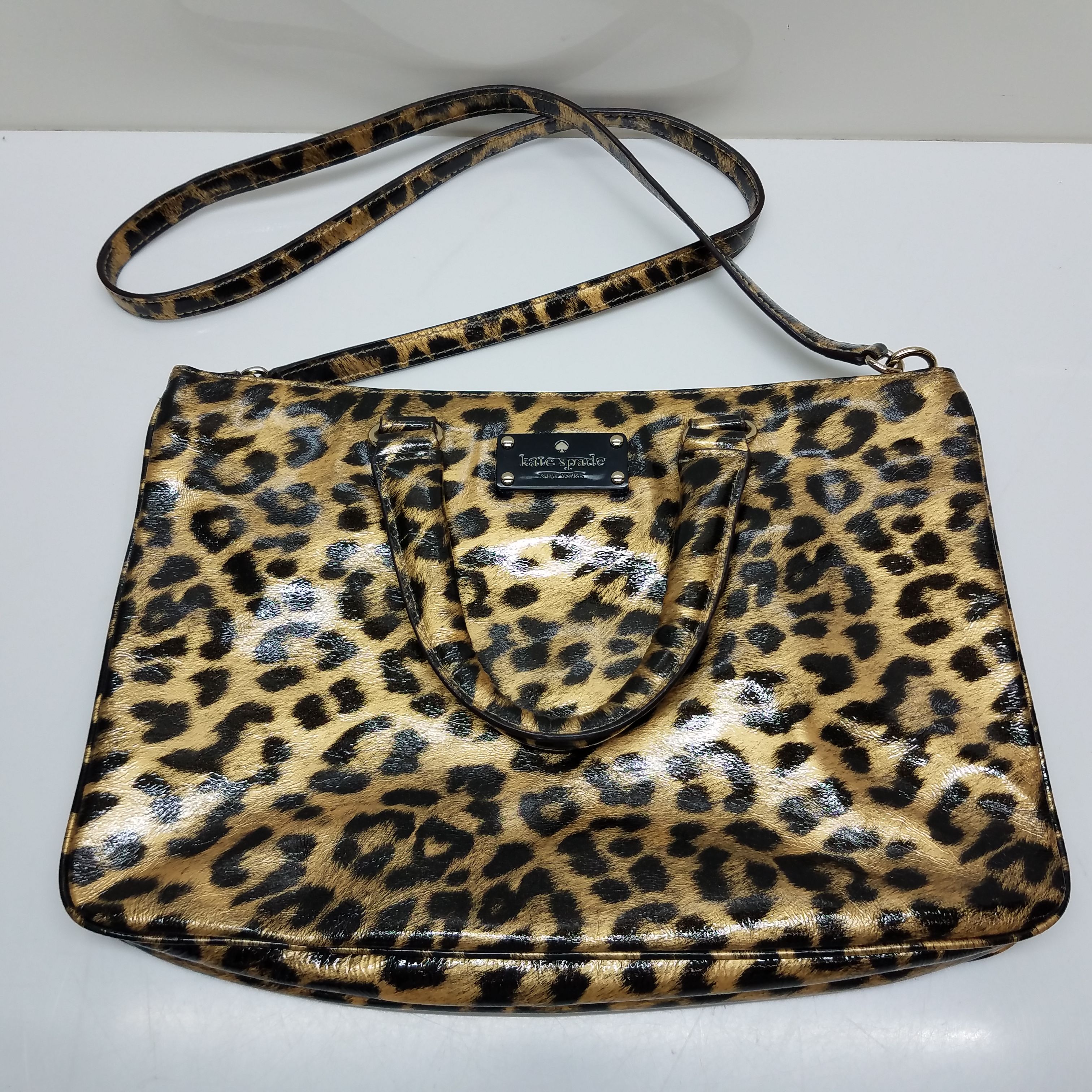 Buy the Metallic patent leather leopard print Kate Spade tote bag ...