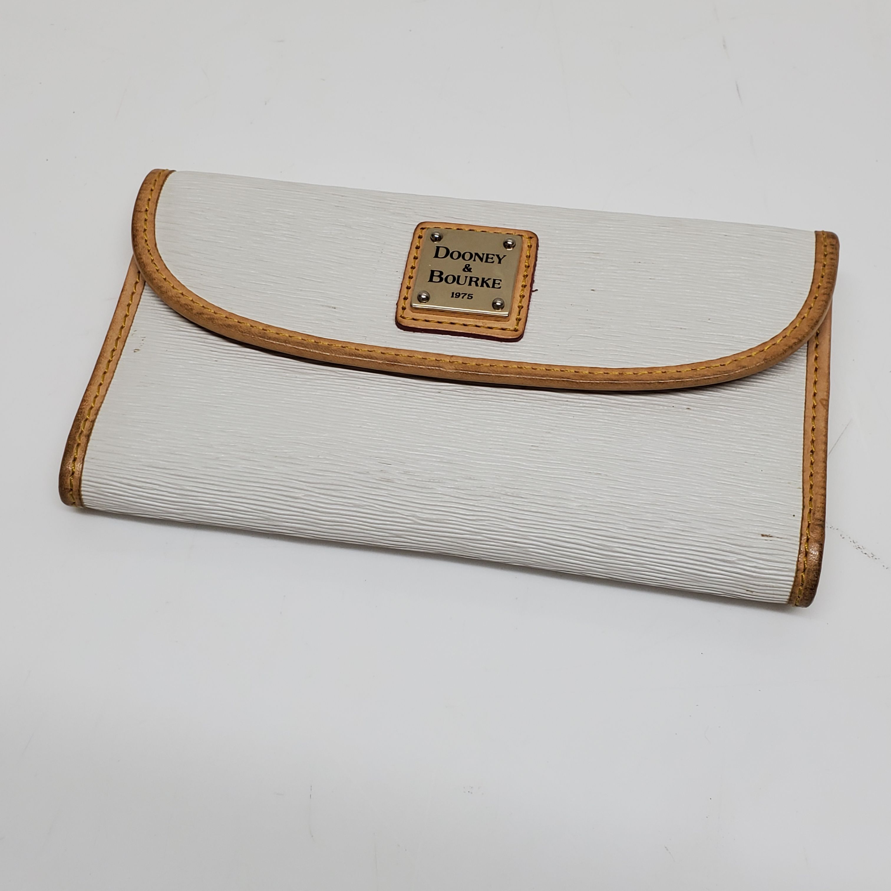 Dooney continental online clutch