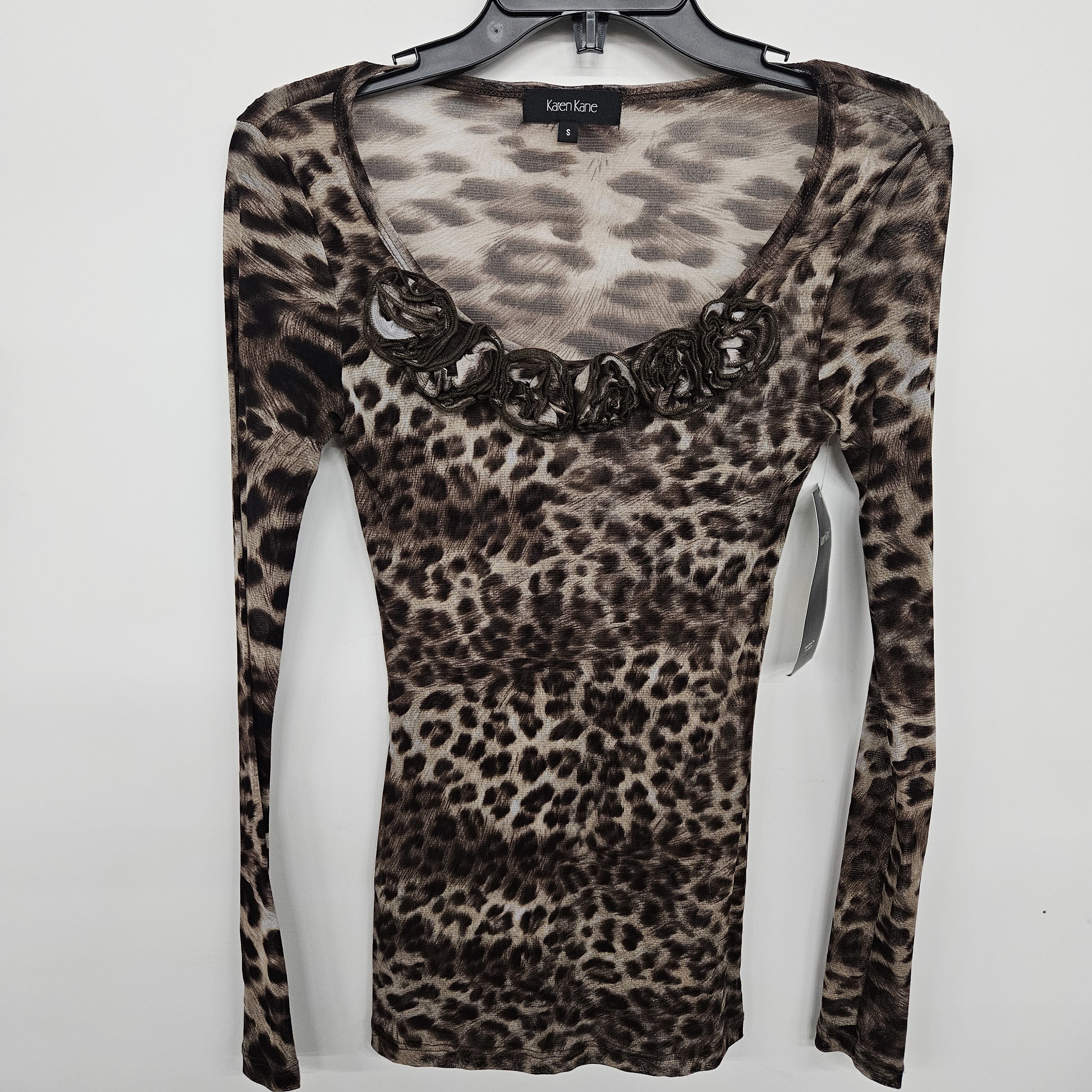 Buy the Cheetah Print Rose Neckline Blouse | GoodwillFinds