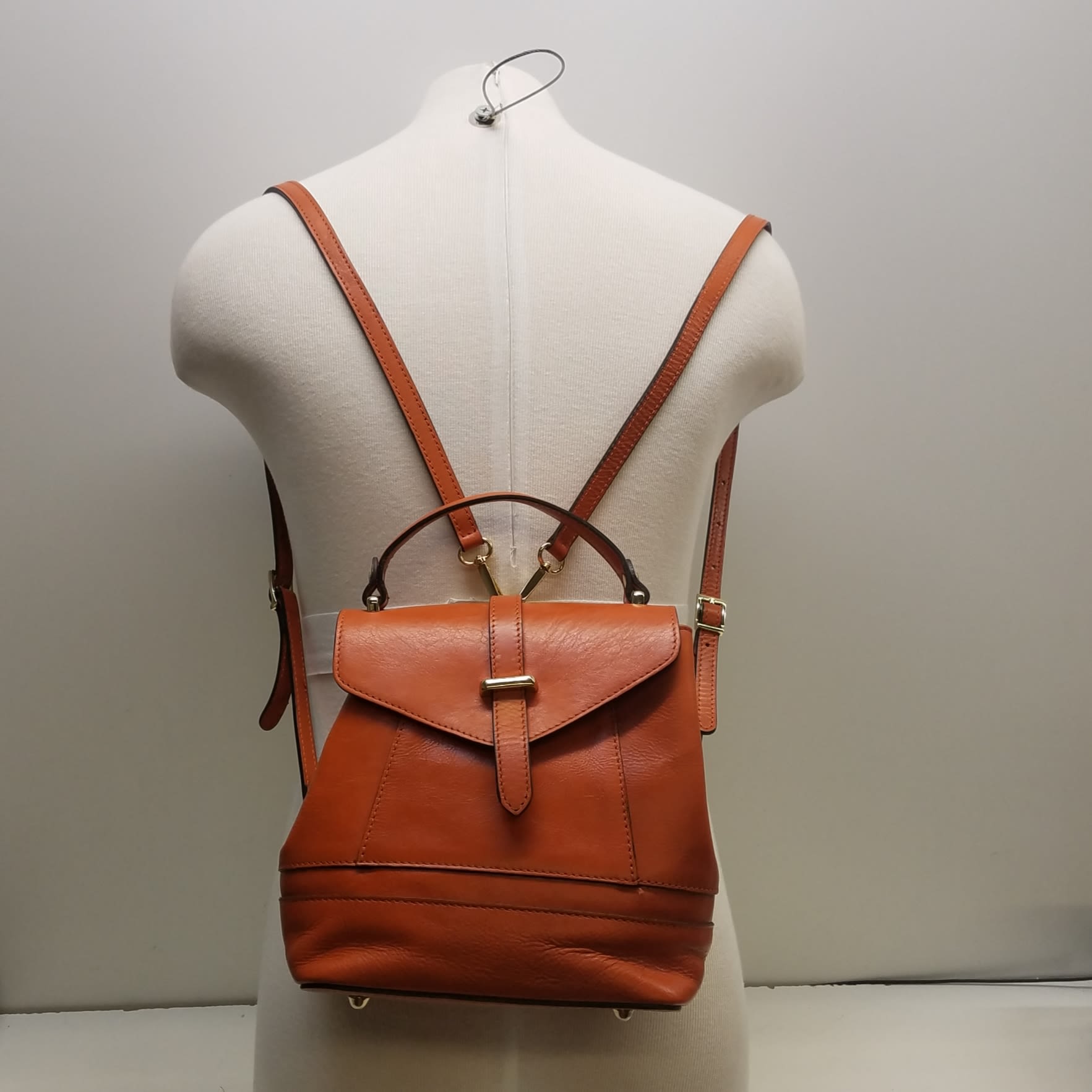 Buy the Divina Firenze Leather Small Backpack Orange | GoodwillFinds