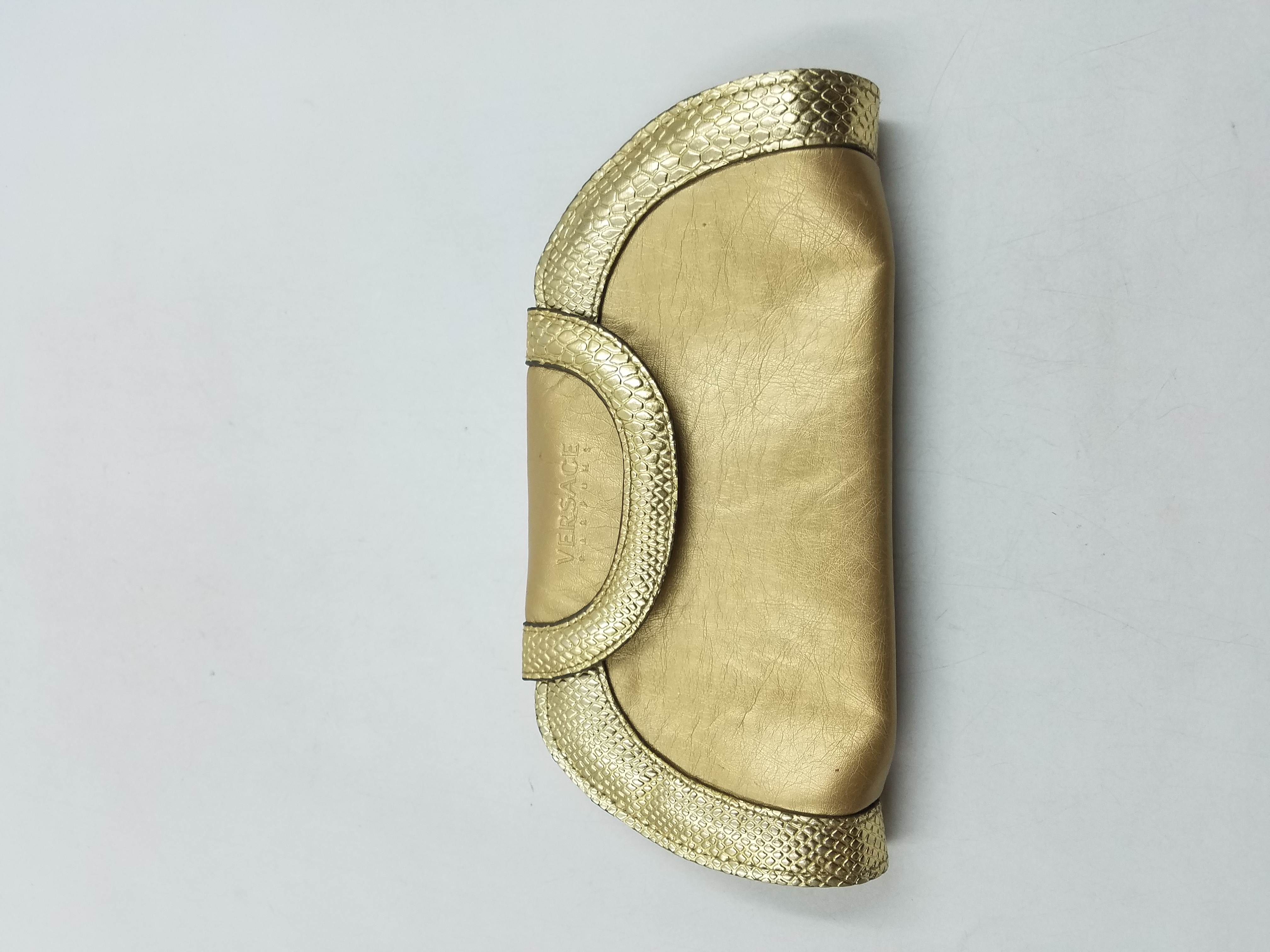 Clutch bag Versace Gold in Polyester - 33294374