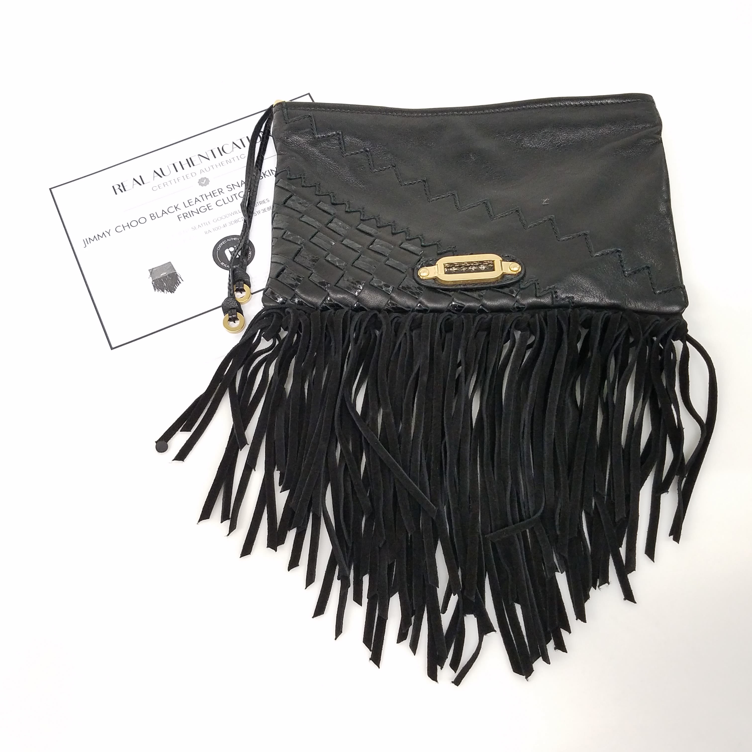 Black fringe clutch discount bag