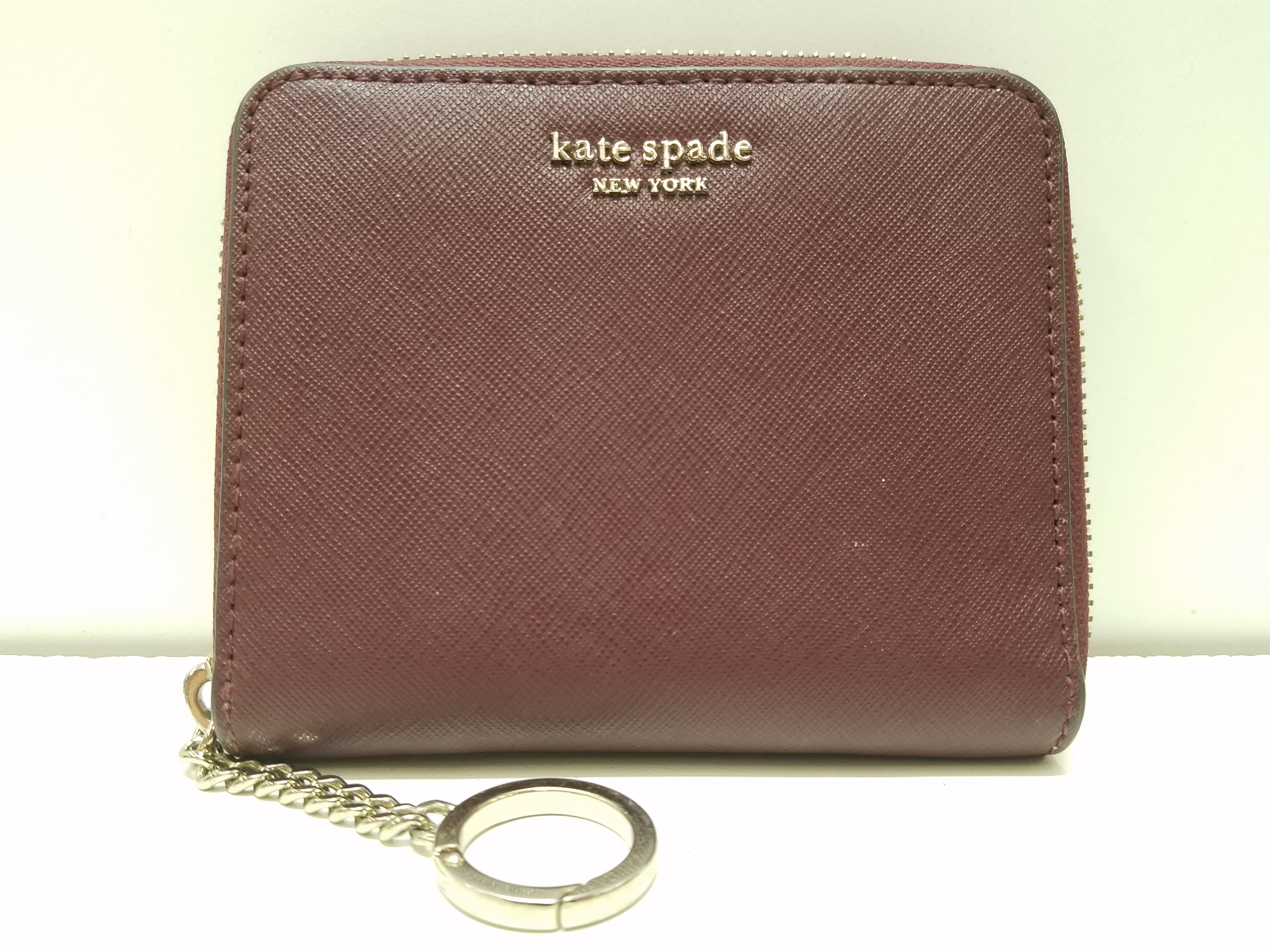 Buy the Kate Spade Zip Around Wallet Maroon GoodwillFinds