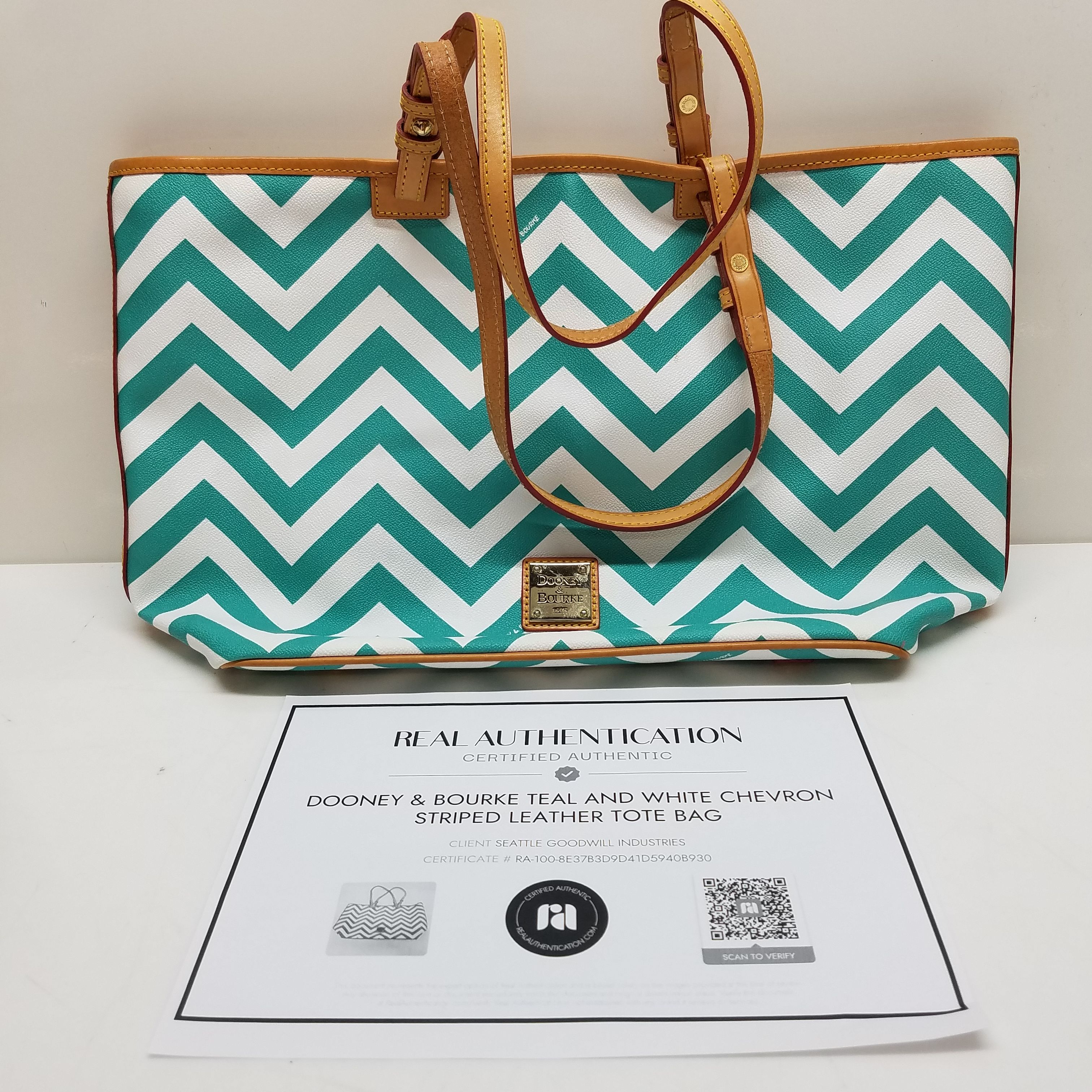 Buy the AUTHENTICATED Dooney Bourke Teal and White Chevron