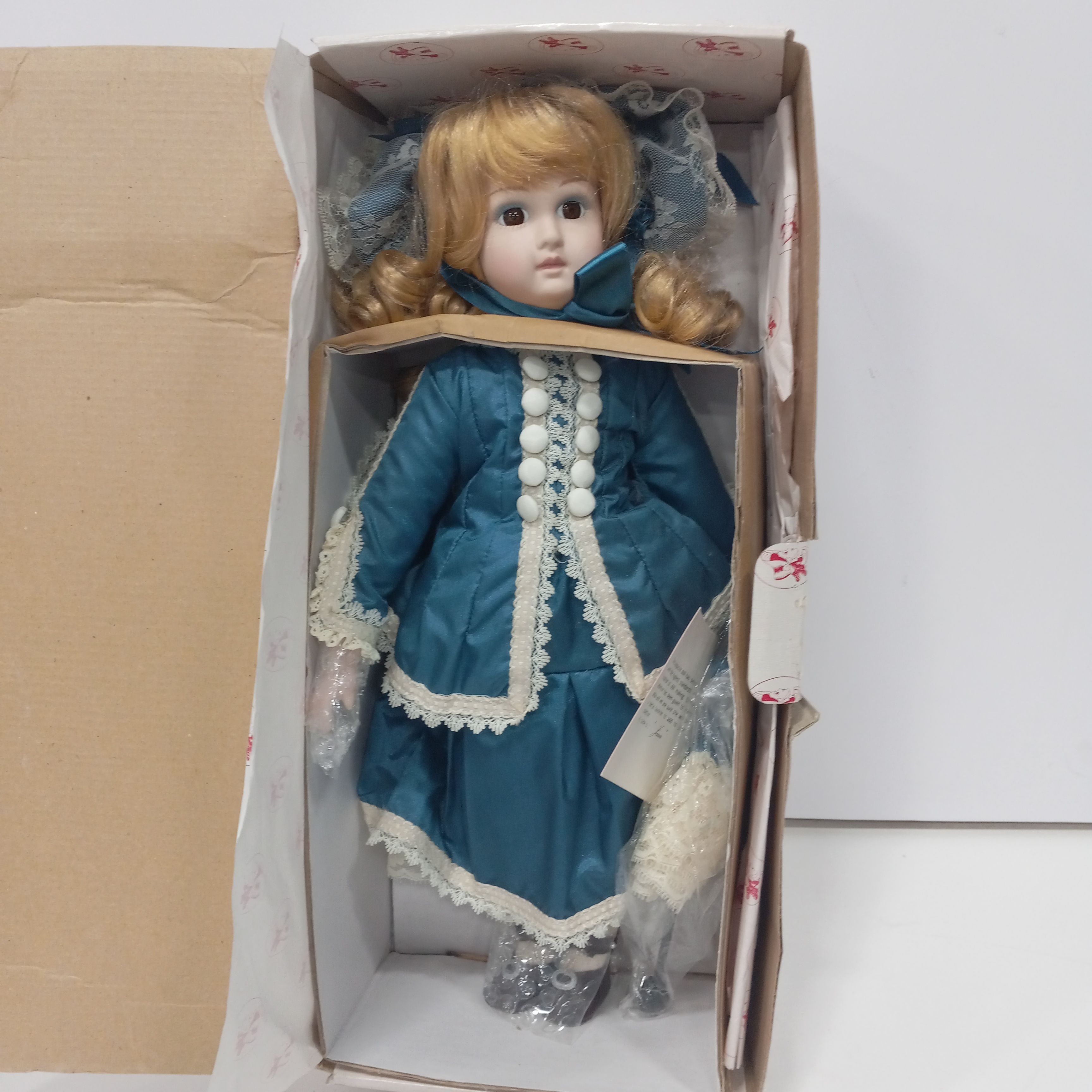 Buy the Design Debut Porcelain Doll IOB | GoodwillFinds