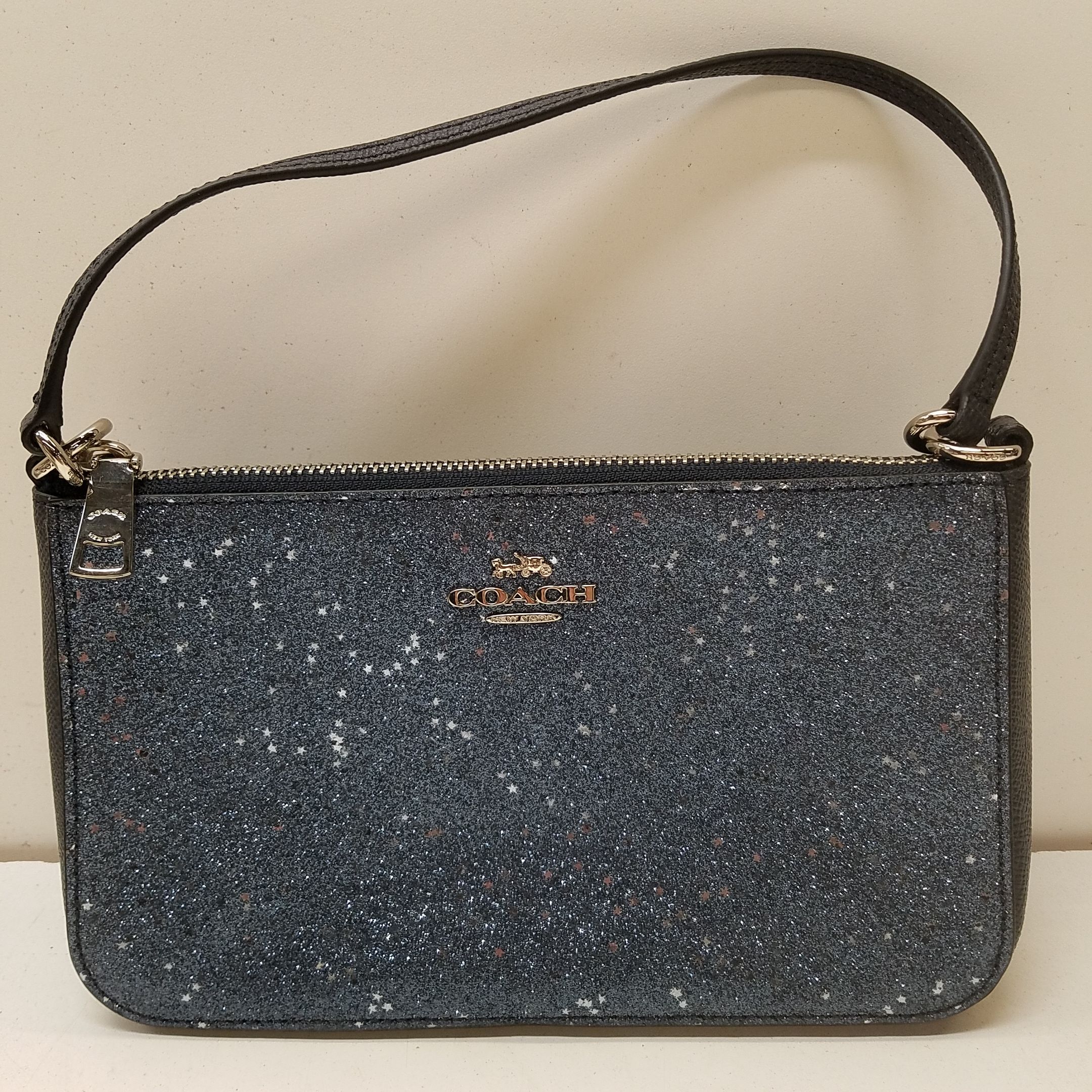 Coach star glitter discount wristlet