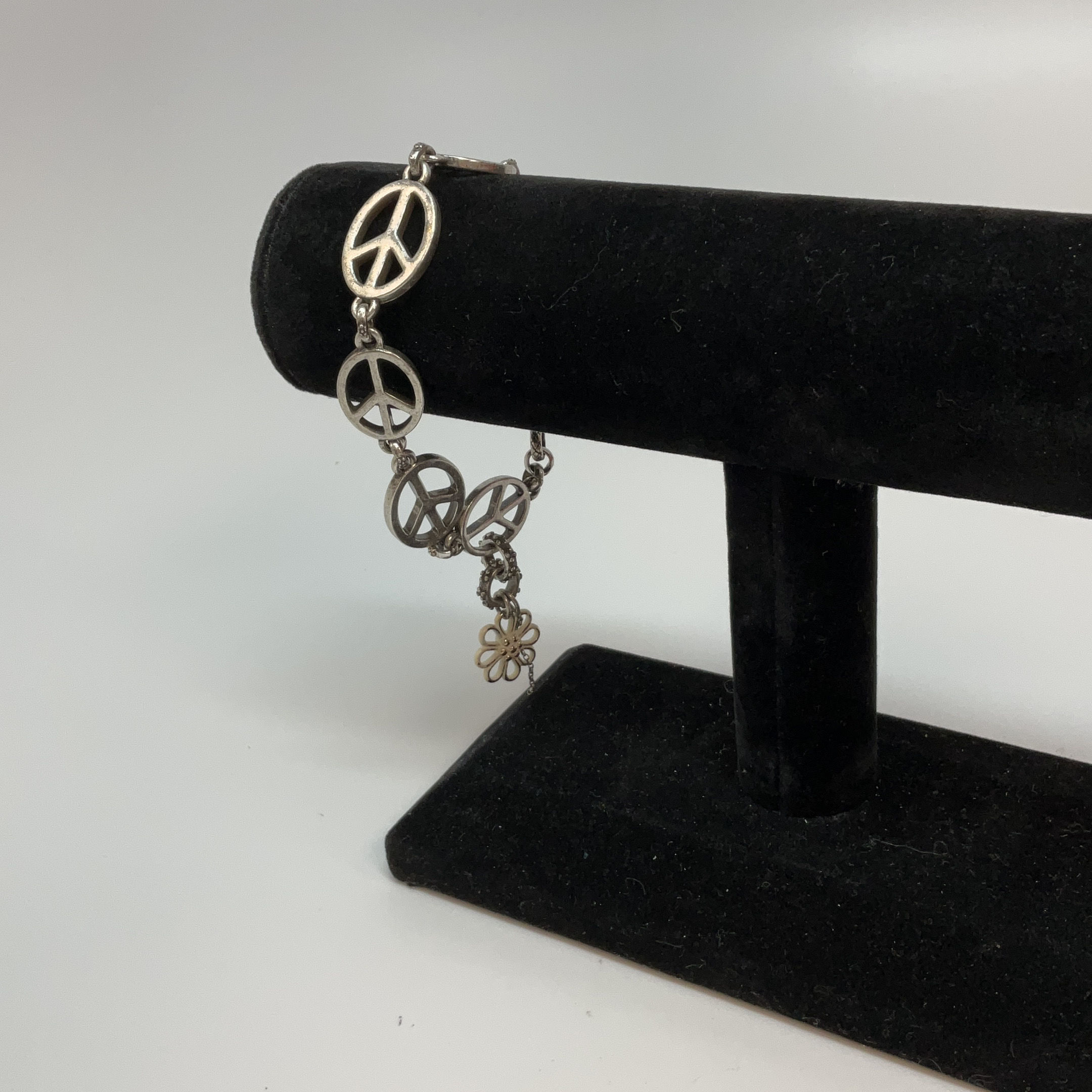 Buy the Designer Lucky Brand Silver-Tone Peace Sign Toggle Flower