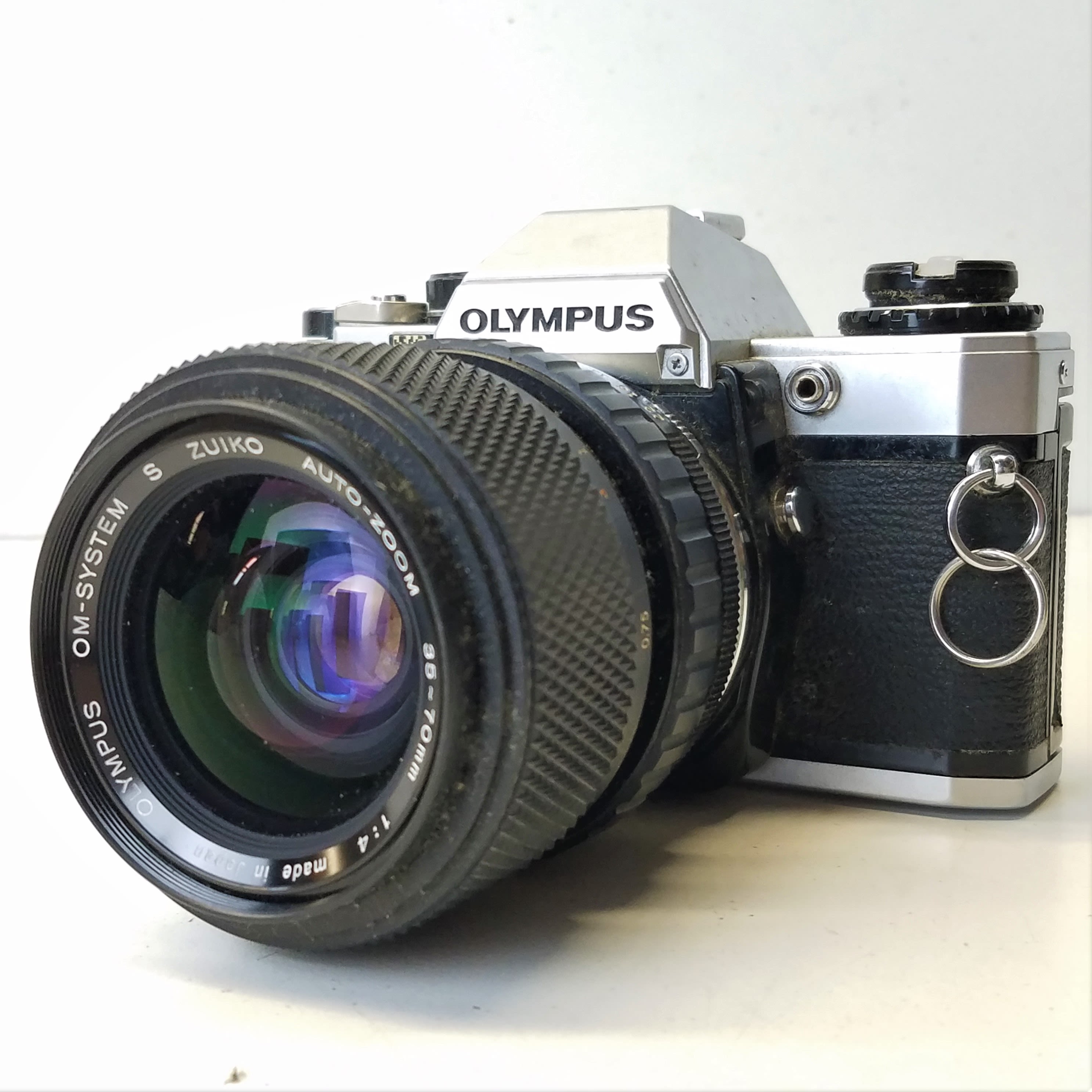 Buy the Olympus OM-10 35mm SLR Camera with Lens | GoodwillFinds