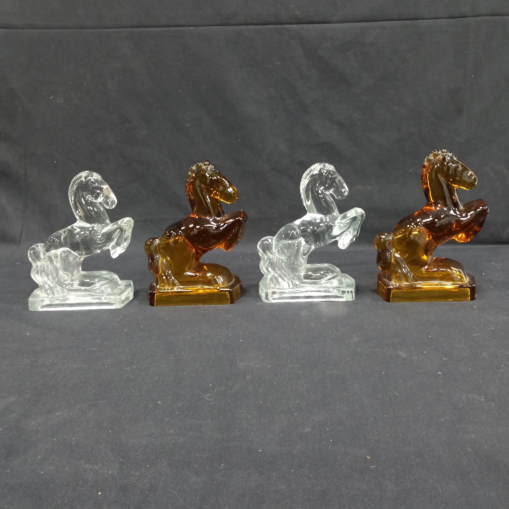 Buy the Set of 4 Glass Horse Sculptures/Figurines/Bookends