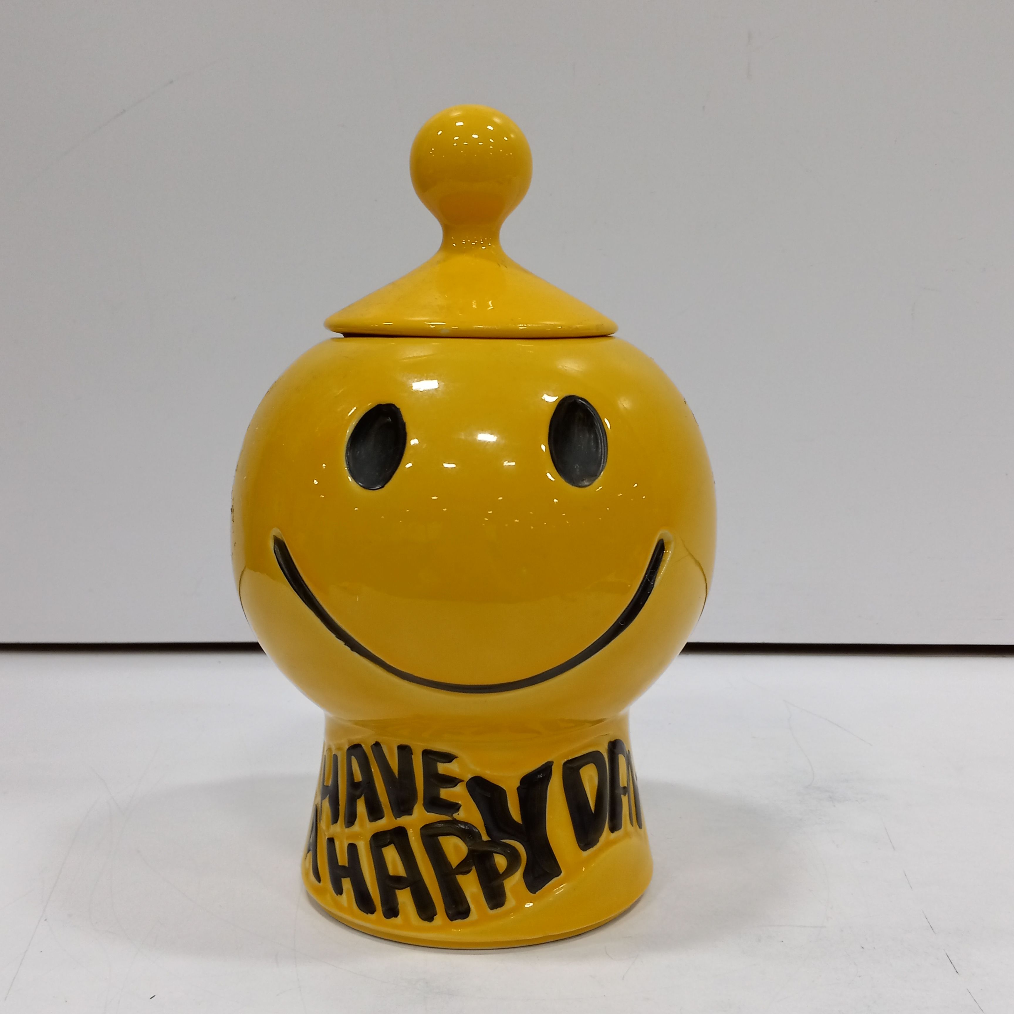 Buy the McCoy smiley face cookie jar | GoodwillFinds