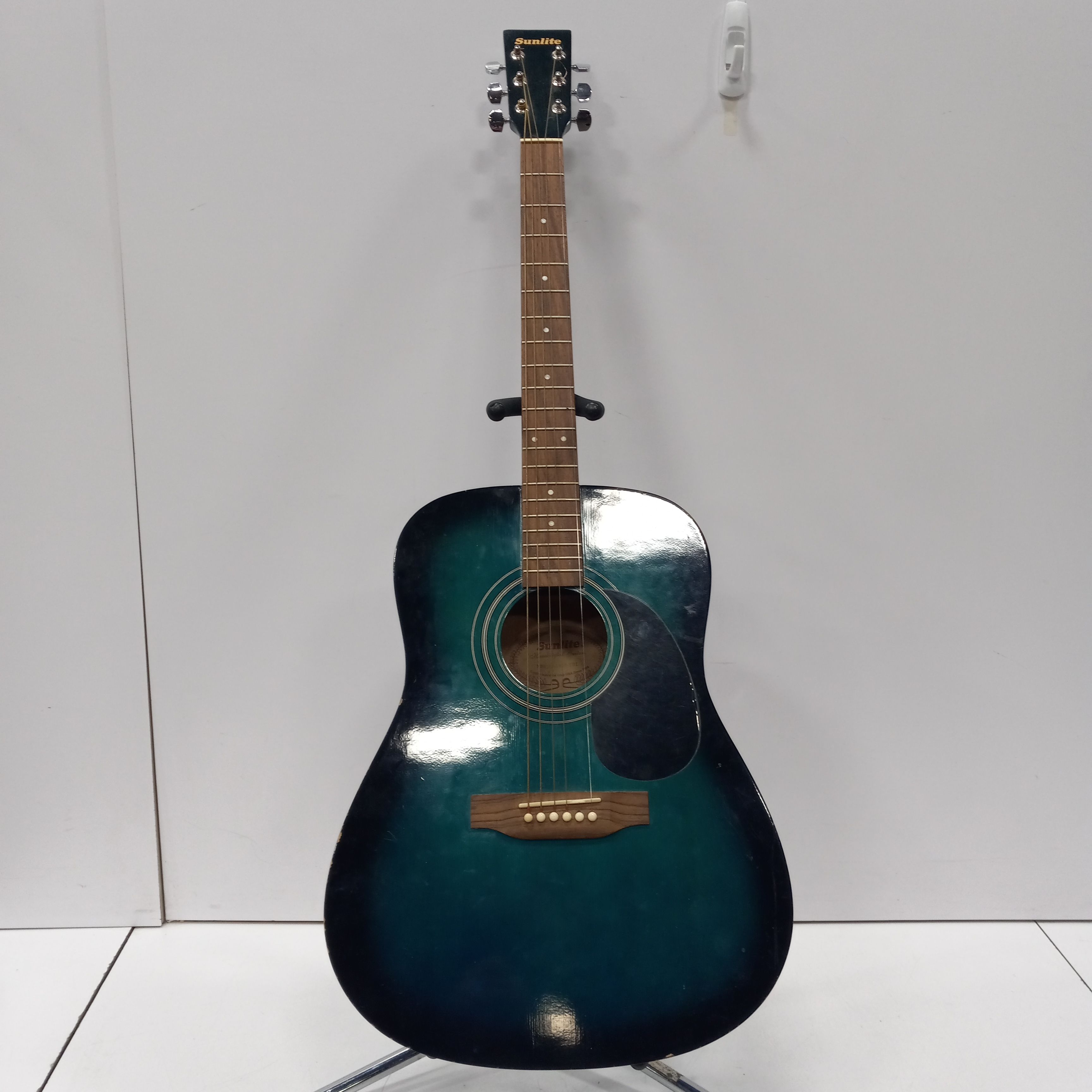 Buy the Wooden Teal Acoustic Guitar | GoodwillFinds