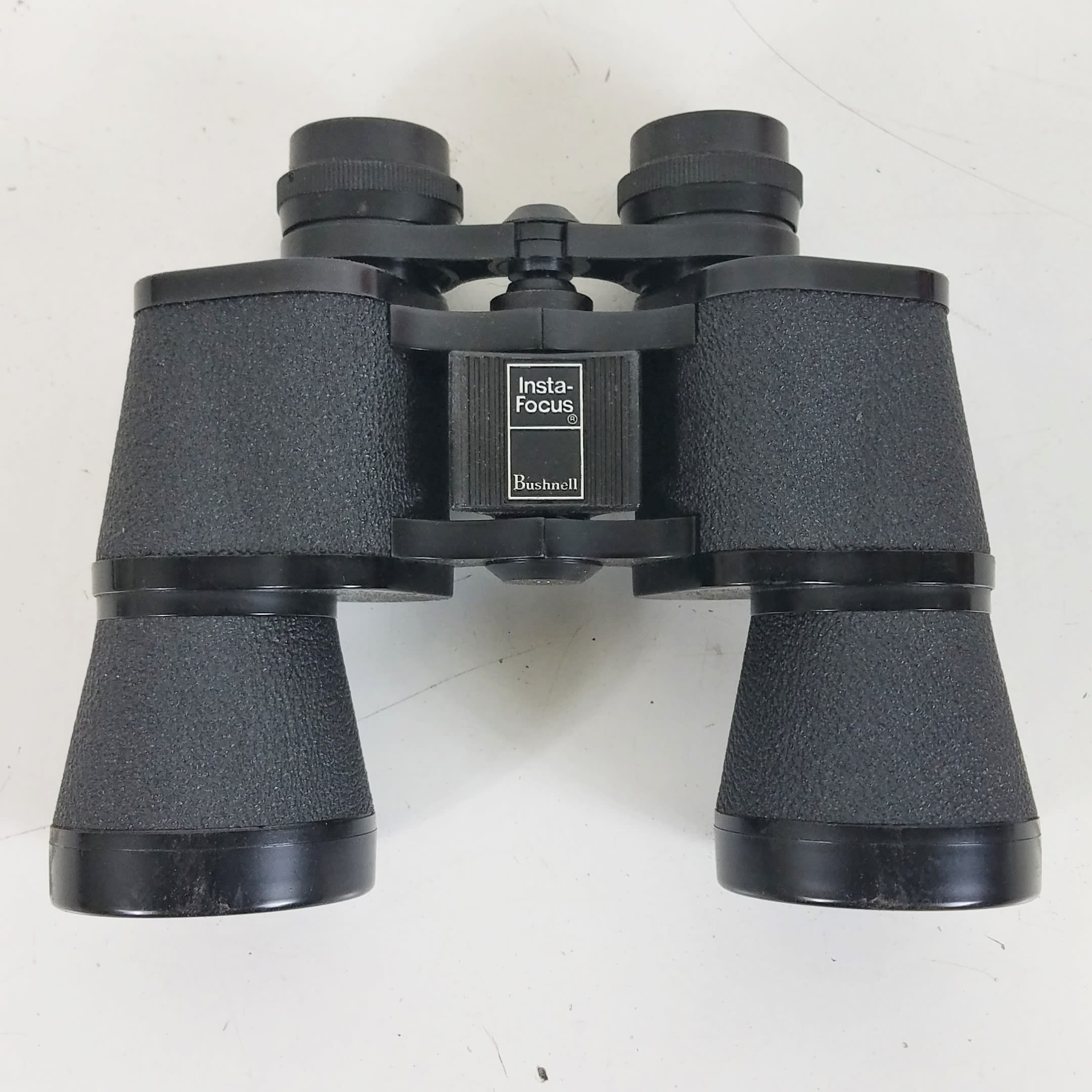 Buy the Bushnell Ensign 10x50 Insta-Focus Binoculars | GoodwillFinds